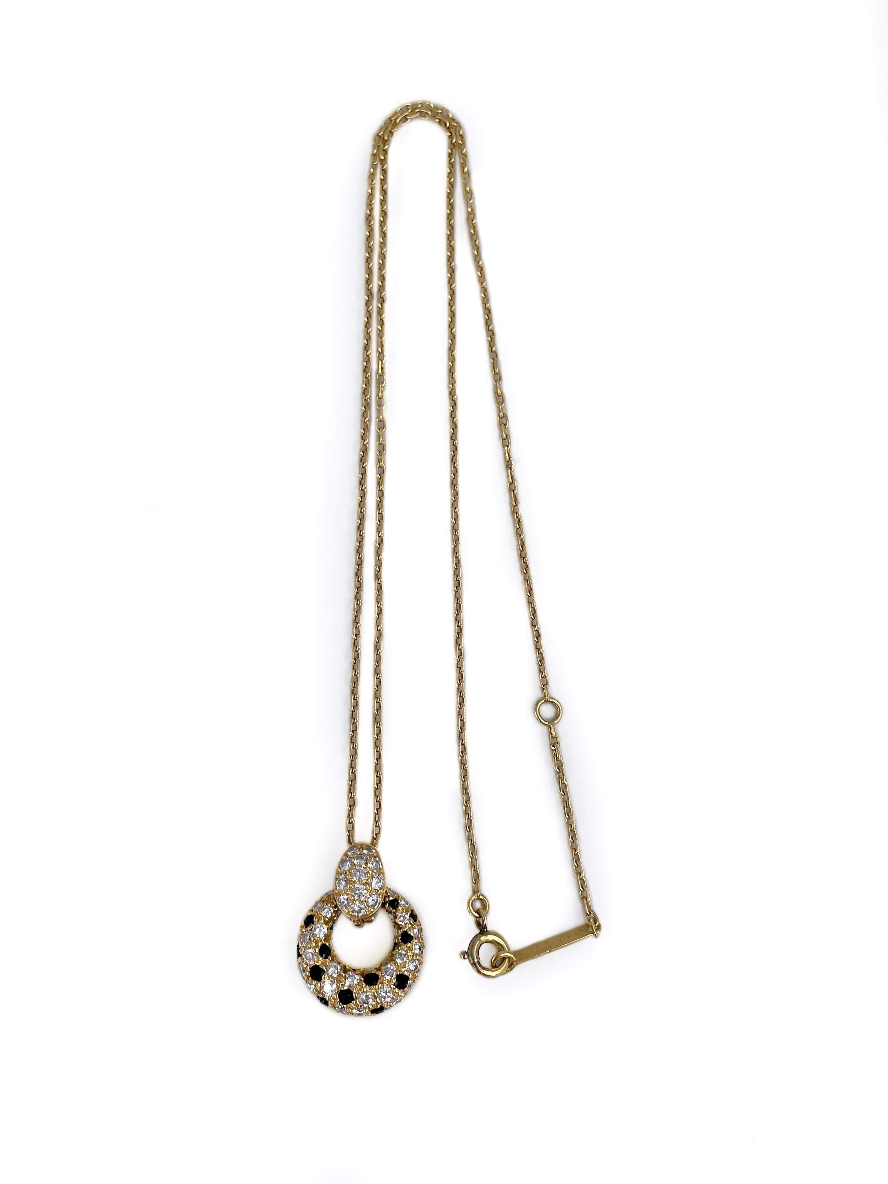 This is a vintage pendant with a chain designed by Van Cleef & Arpels in 1980s. It is crafted in 18K yellow gold. 

The piece features: 
- 49 diamonds (round brilliant cut, TW 1.2ct, RW+/RW, VVS-VS)
- 20 black chalcedonies

The pendant can be