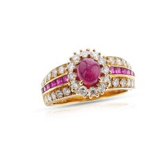1980s Van Cleef & Arpels Ruby Cabochon and Diamond Halo Ring, 18k