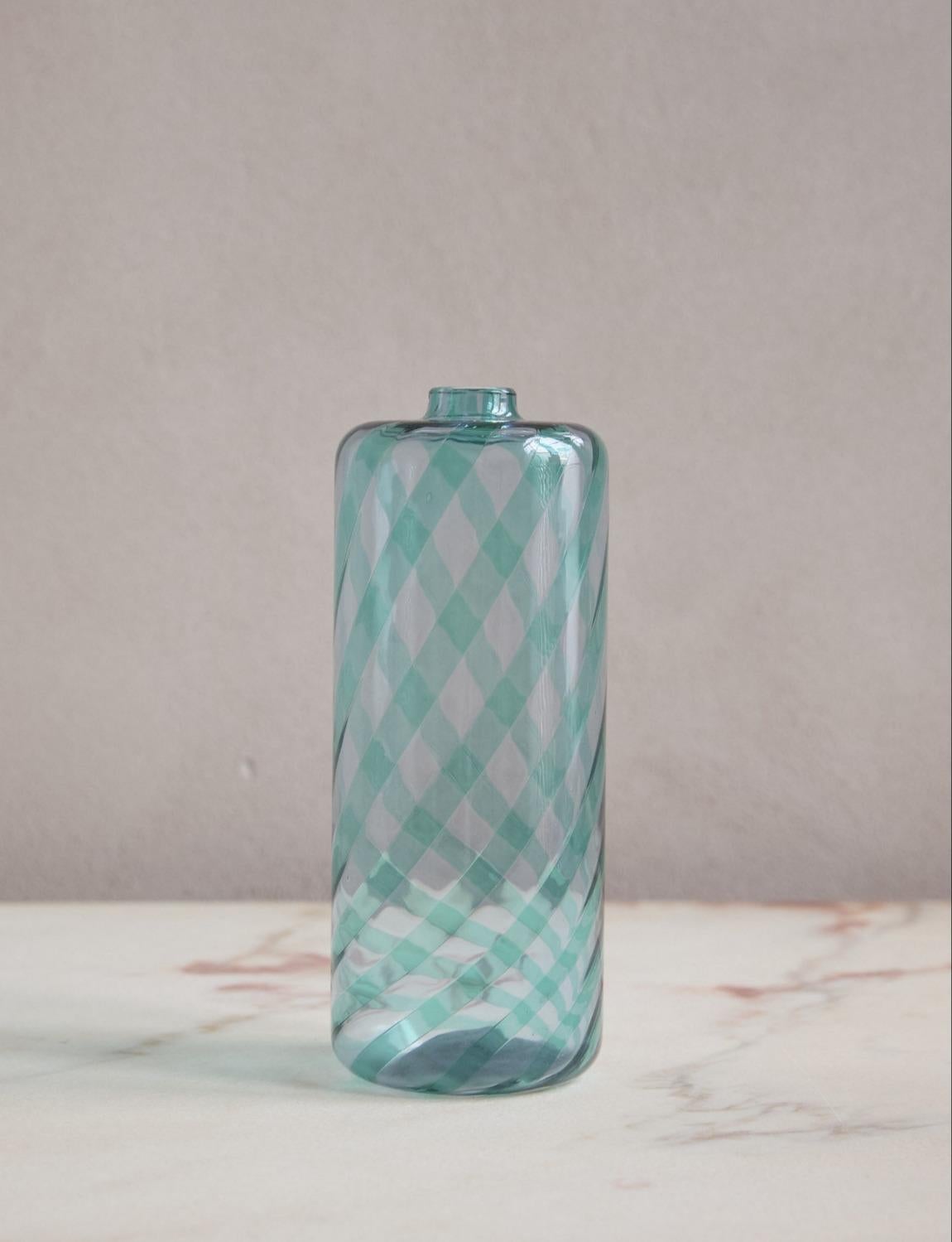 A beautiful hand-blown decorative bottle-shaped vase made in 1983 in Venice. Signed and dated on the base by the Venetian furnace VeArt. The bottle is blown with a spiral turquoise pattern and is extremely pretty.
