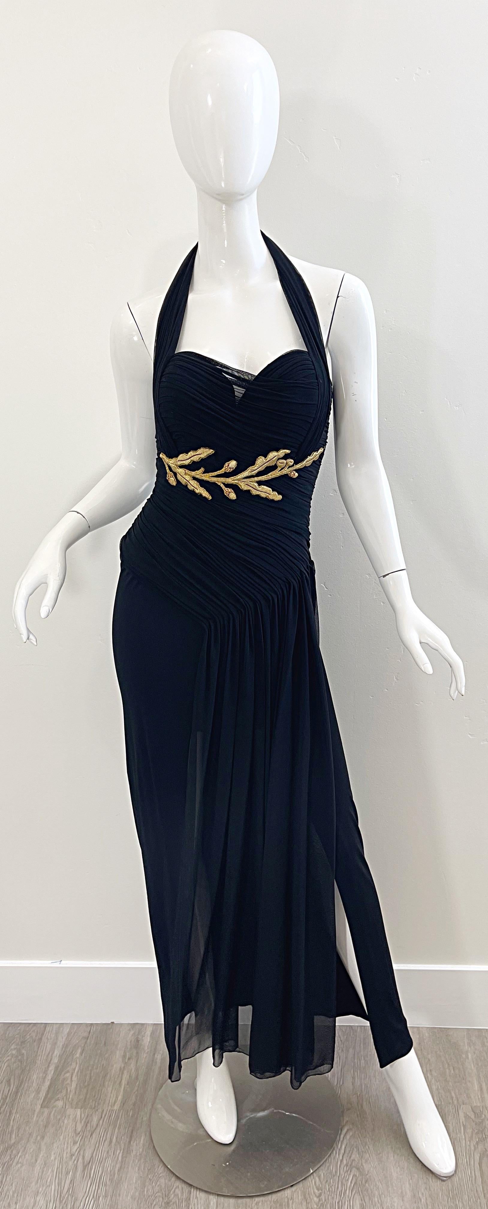 Gorgeous vintage 80s VICKY TIEL COUTURE black silk mesh halter gown ! This dress has it all—flattering ruched boned bodice, gold leaf embroidery, and a sexy slit that reveals just the right amount of leg. Hidden zipper up the back with hook-and-eye