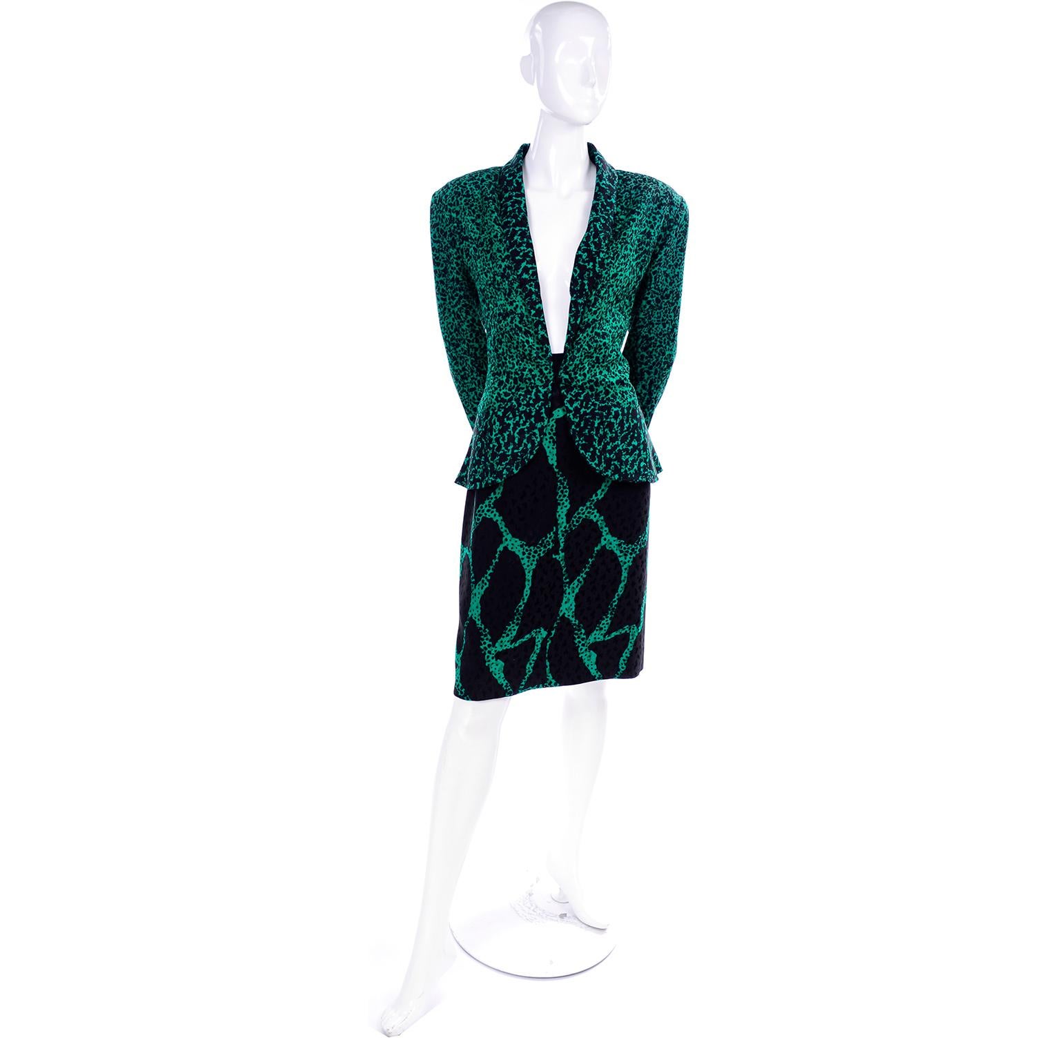 This outfit is an example of pattern mixing at its finest! This is a Vicky Tiel electric green and black skirt suit with an abstract animal print pattern. This beautiful suit was purchased at Neiman Marcus in the 1980's.  It includes a peplum jacket