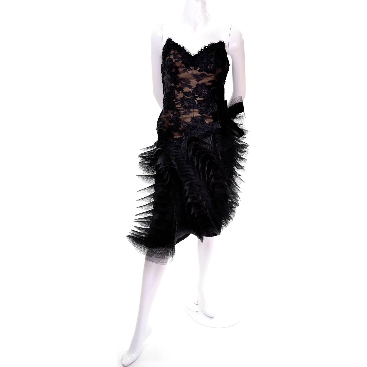 This incredible vintage Victor Costa strapless evening dress was purchased at The Salon at Elizabeth Arden in the 1980's. This stunning dress has an incredible skirt with layers of beautifully sculpted tulle. The sweetheart strapless bodice has