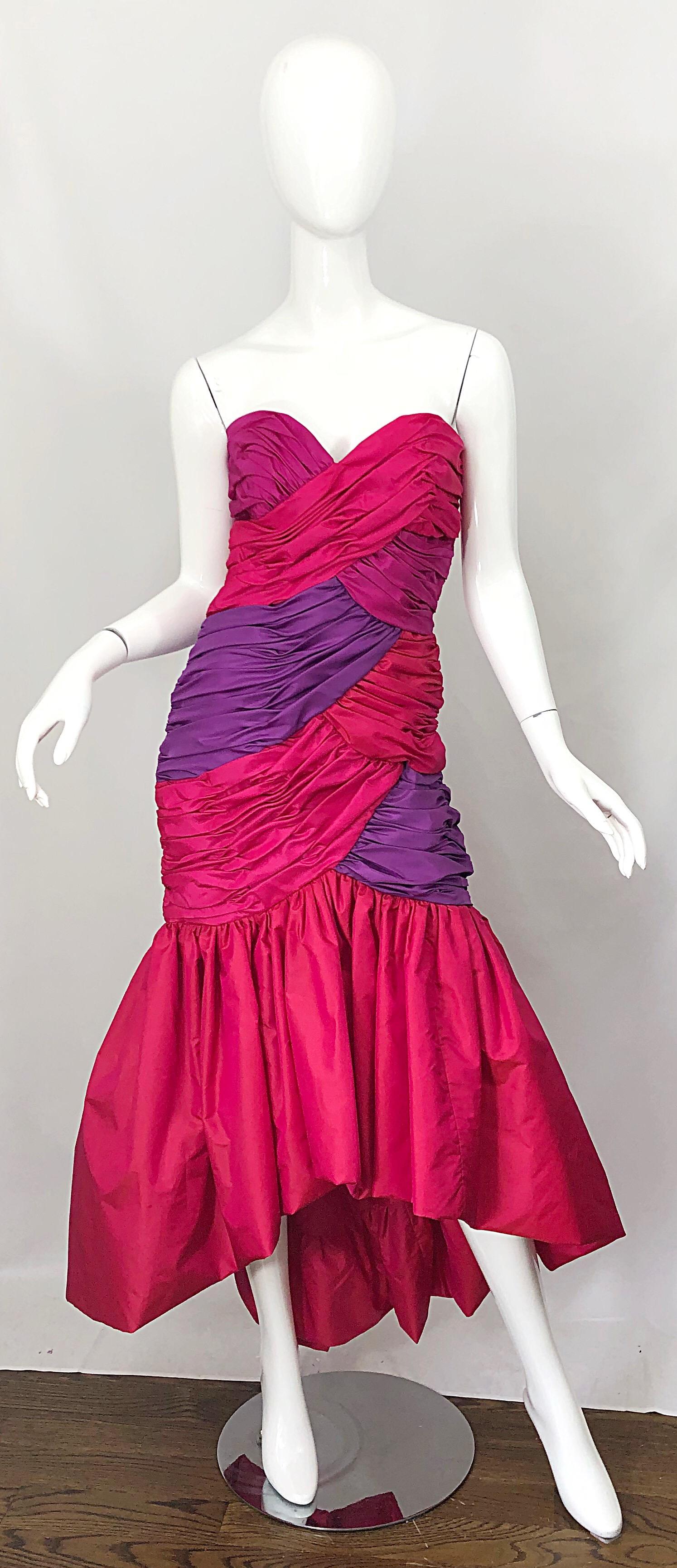 Incredible Avant Garde 1980s VICTOR COSTA lipstick red, fuchsia pink and purple color block strapless hi-lo flamenco style evening gown! Flattering ruched boned bodice holds everything in place. Hidden zipper up the back with hook-and-eye closure.