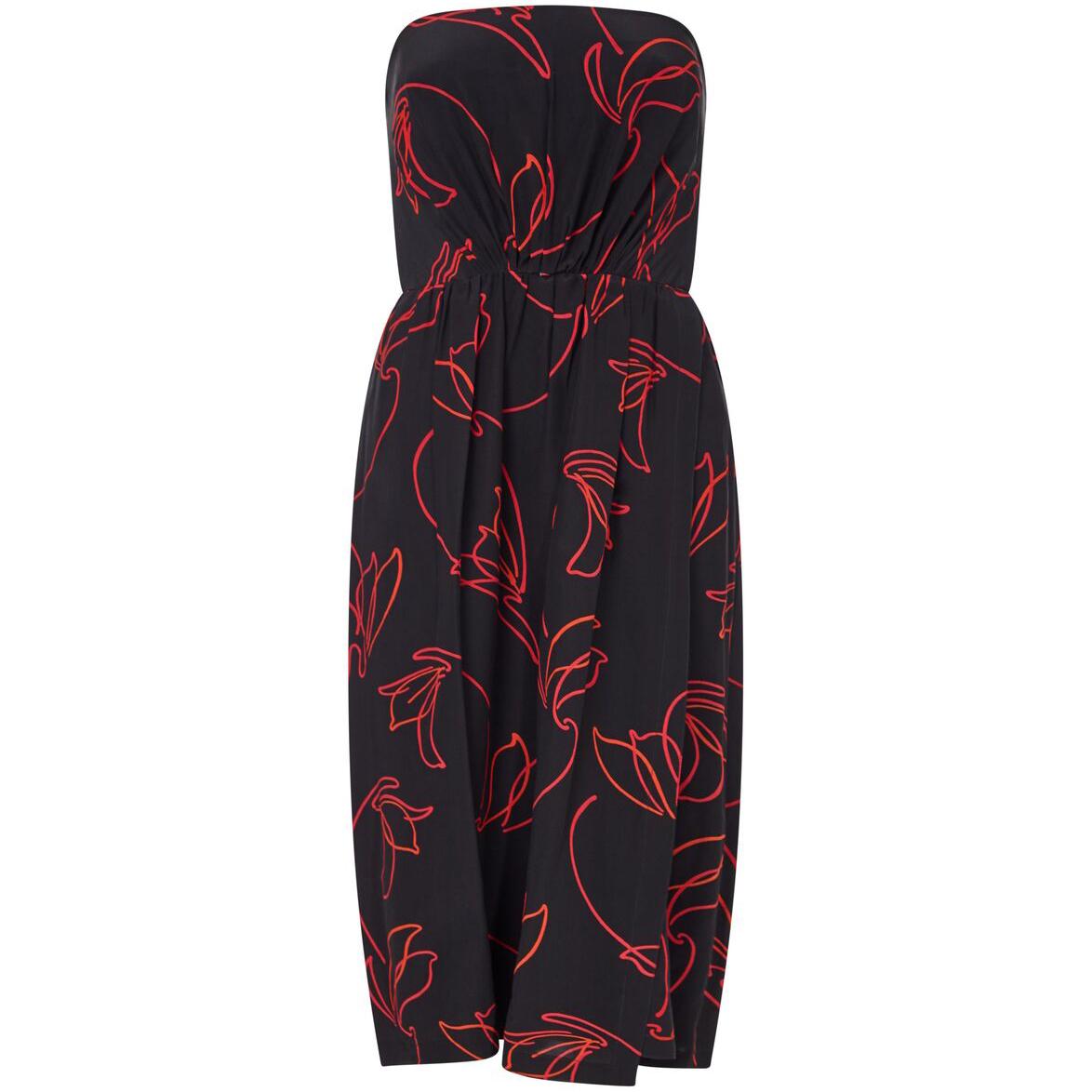 This stylish 1980s abstract print silk two piece set by Victor Edelstien is in immaculate condition and extremely adaptable. The pure silk fabric is black with a vibrant red linear floral design of a dynamic that lends itself effortlessly to