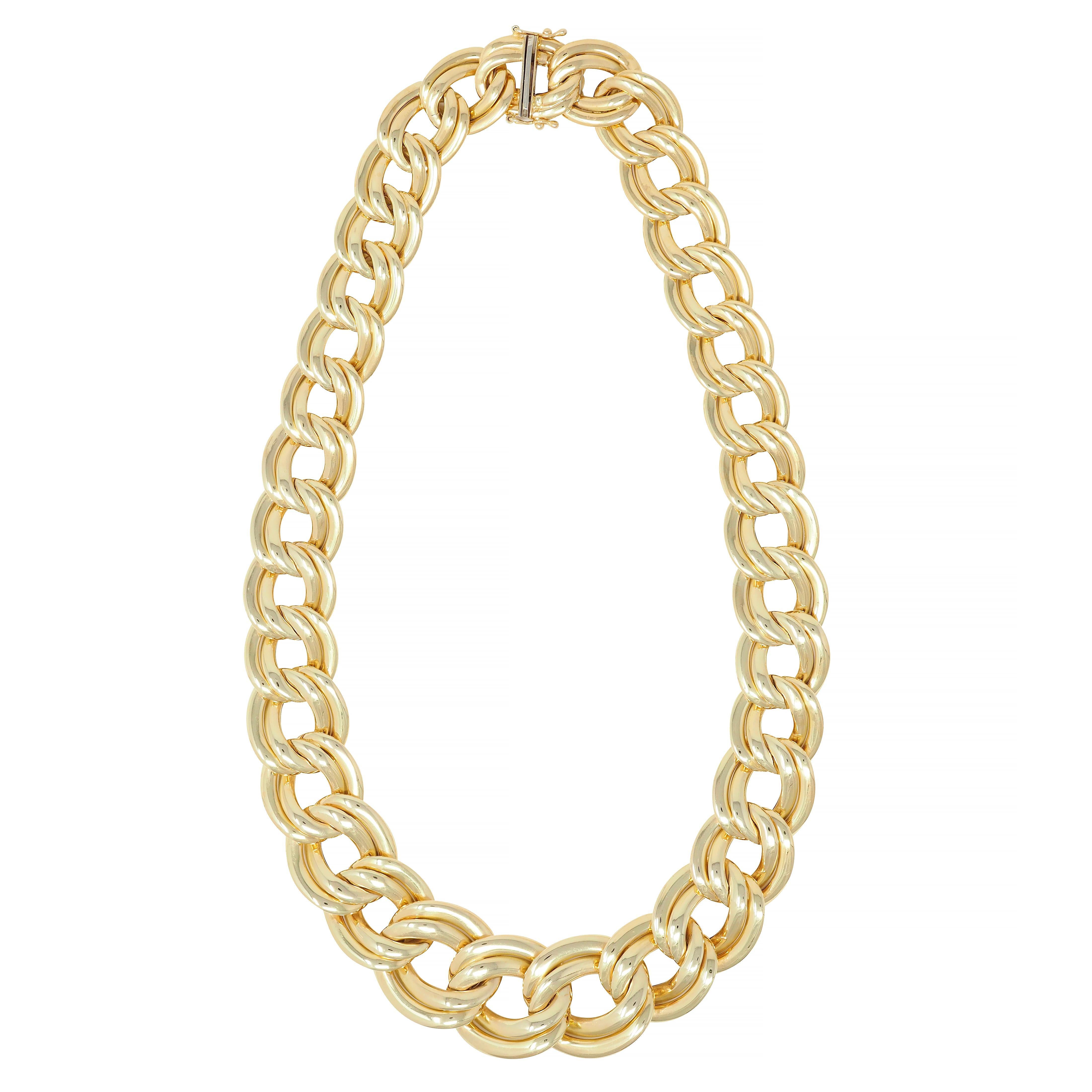 Comprised of oval shaped curb links 
Doubled and graduated 
With high polish finish
Completed by press release clasp 
With double figure eight safety 
Stamped for 14 karat gold
Stamped for Italy
Circa: 1980s
Width at Widest: 1 inch
Total Length: 17