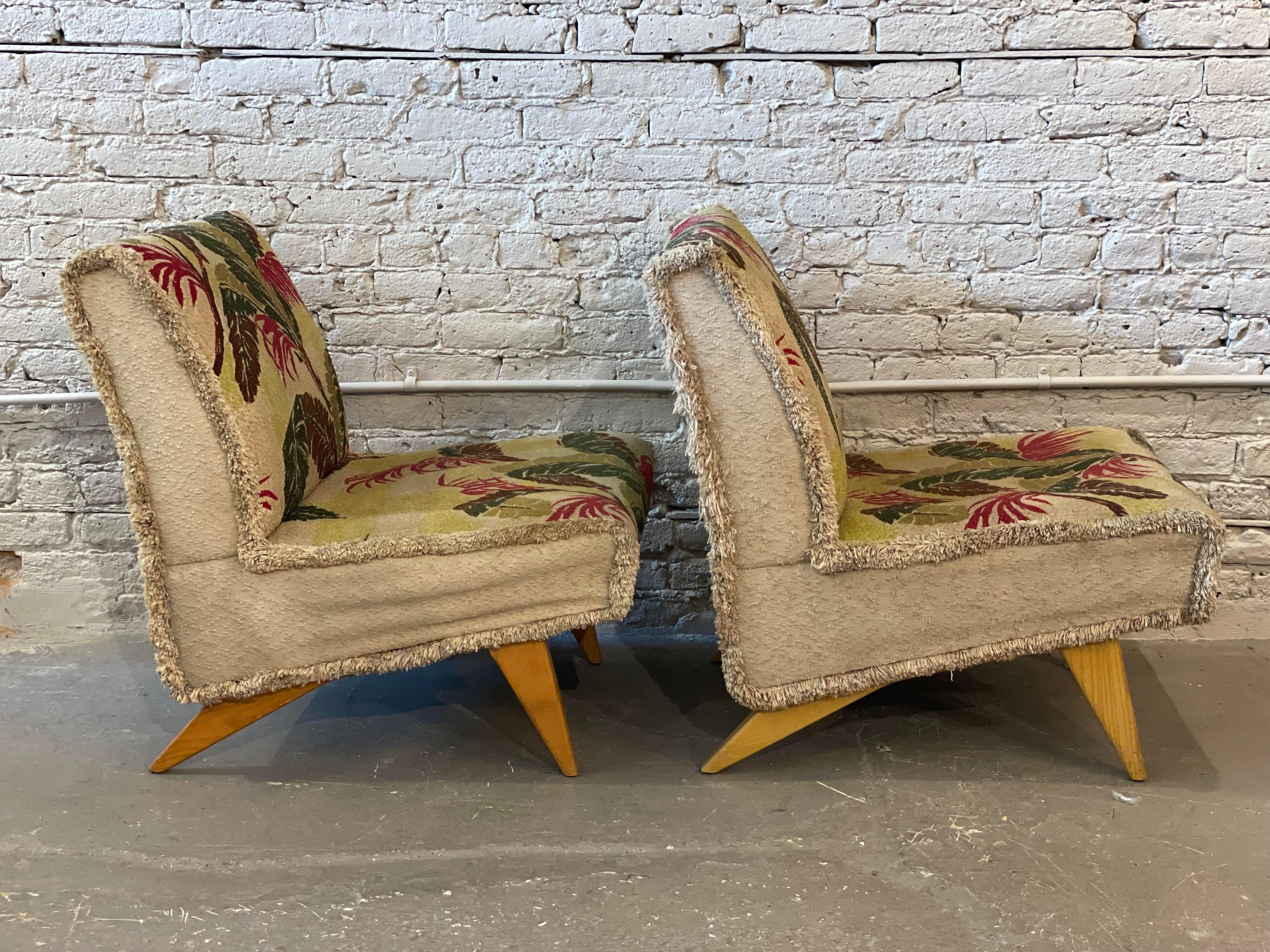 Solid wood legs and very solid frame. These chairs are heavy, sturdy and very comfortable. Love love the wooden legs.

Please note - they need new foam and fabric.
 