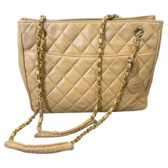 1980s Vintage Chanel Beige Lambskin Leather and Brass Shoulder Bag