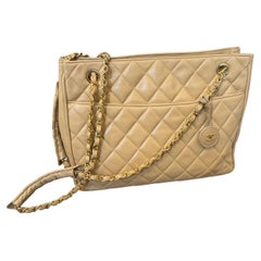 1980s Vintage Chanel Beige Lambskin Leather and Brass Shoulder Bag
