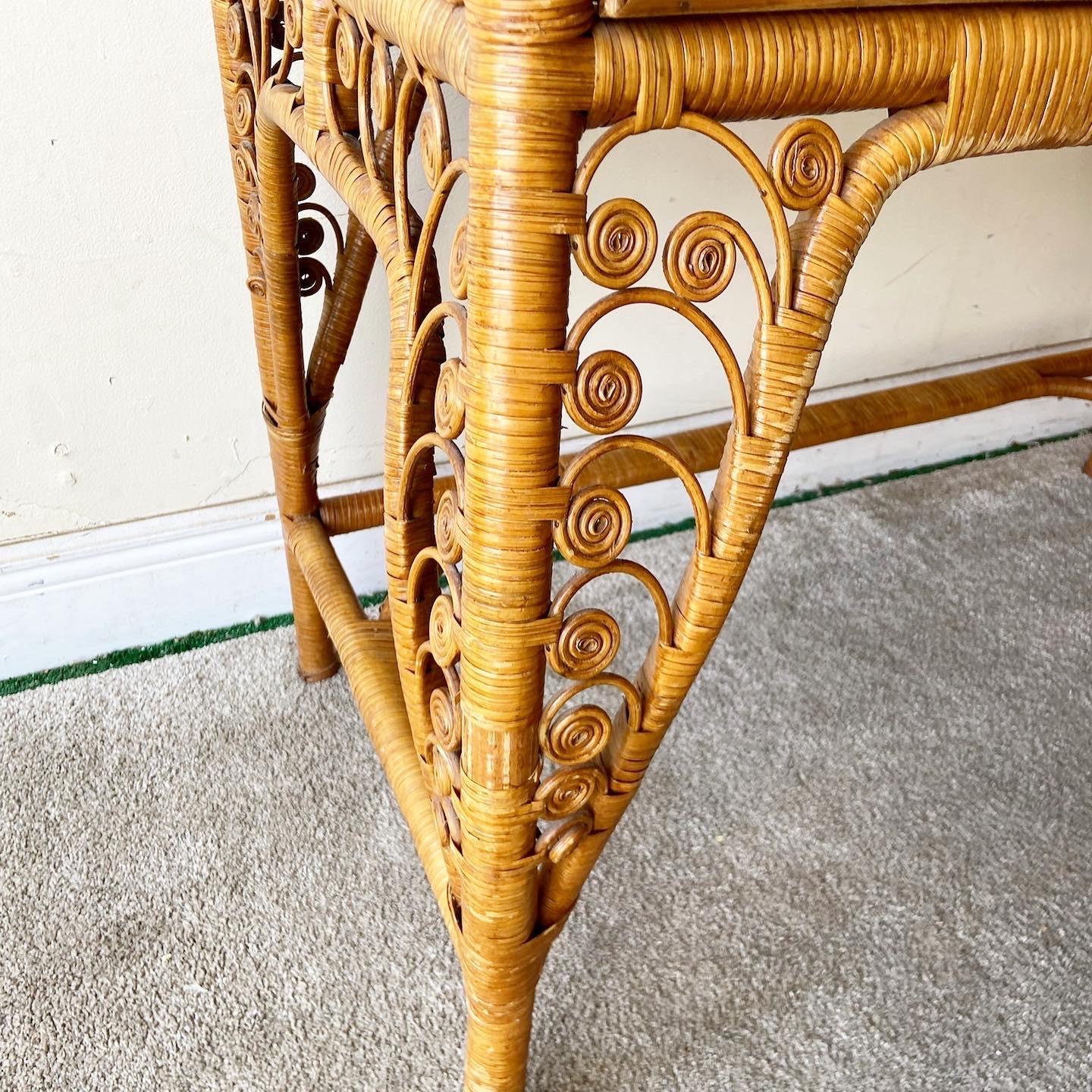 Amazing vintage boho chic wicker desk and rattan desk. Features two spacious drawers and a fabulous swirl framing.
 