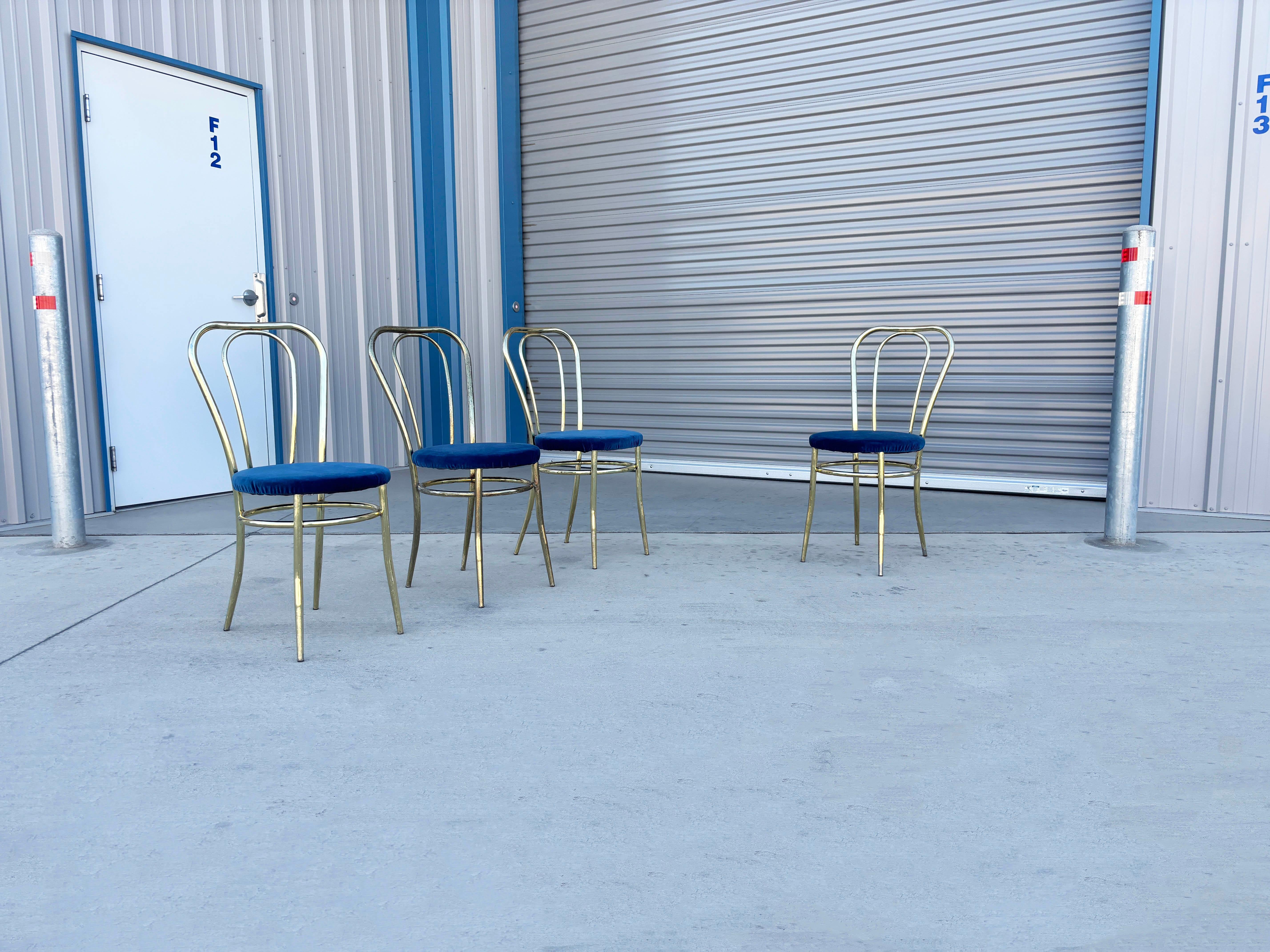 ✨ Glamorous 1980s Vintage Brass Dining Chairs ✨

Bring a touch of vintage sophistication to your space with this stunning set of four brass dining chairs, expertly crafted in the United States during the 1980s. Each chair features a beautifully