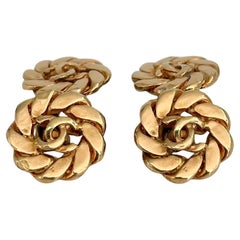 Gemelli Chanel vintage anni '80 con logo CC in oro e catena rotonda