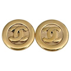 1980s Vintage Chanel Gold Tone CC Logo Round Clip On Earrings