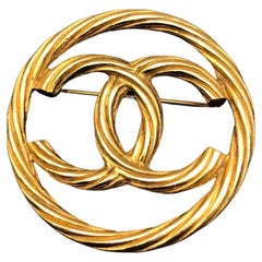 1980s Vintage CHANEL Gold Toned CC Brooch Rope Sling 