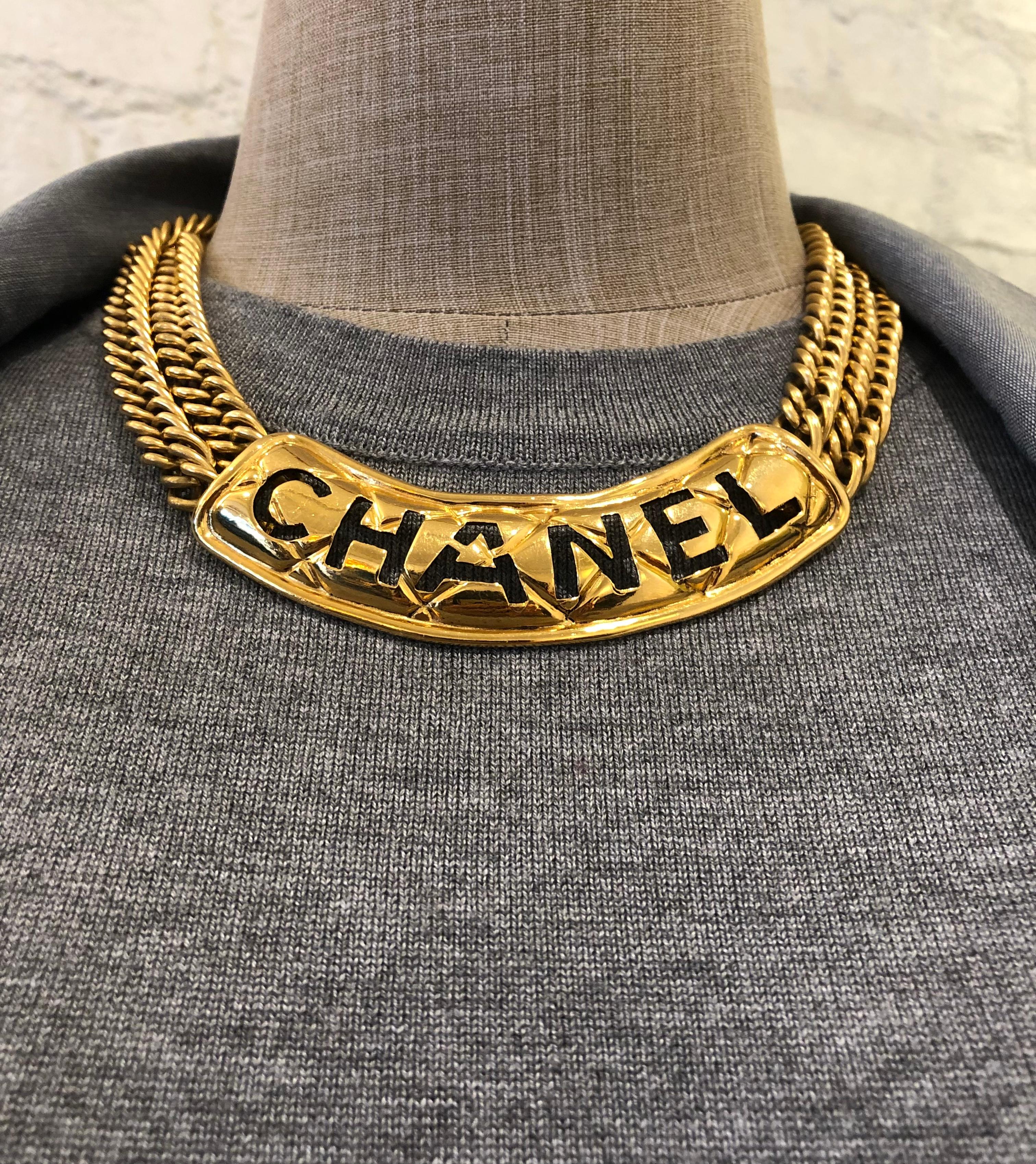 1980s Vintage CHANEL Gold Toned Cut Out Letter Chain Necklace For Sale 1