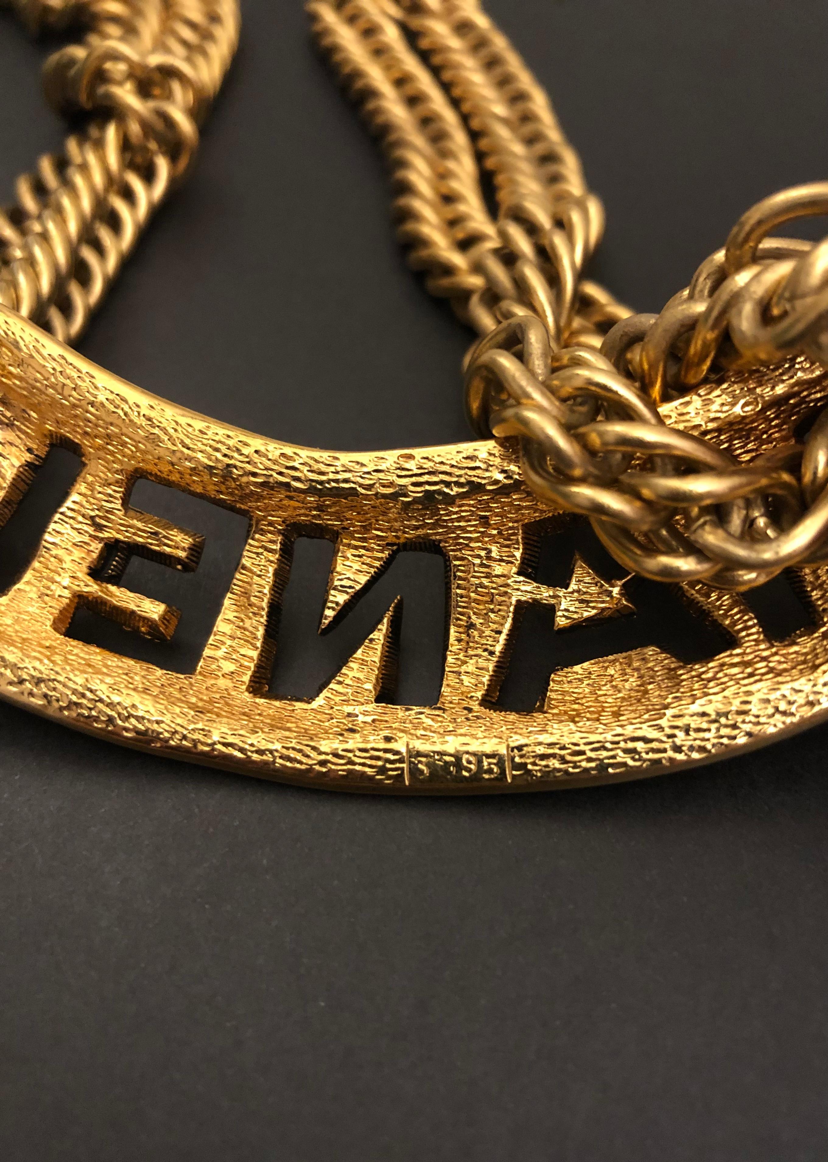 1980s Vintage CHANEL Gold Toned Cut Out Letter Chain Necklace For Sale 2