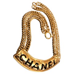 1980s Vintage CHANEL Gold Toned Cut Out Letter Chain Necklace