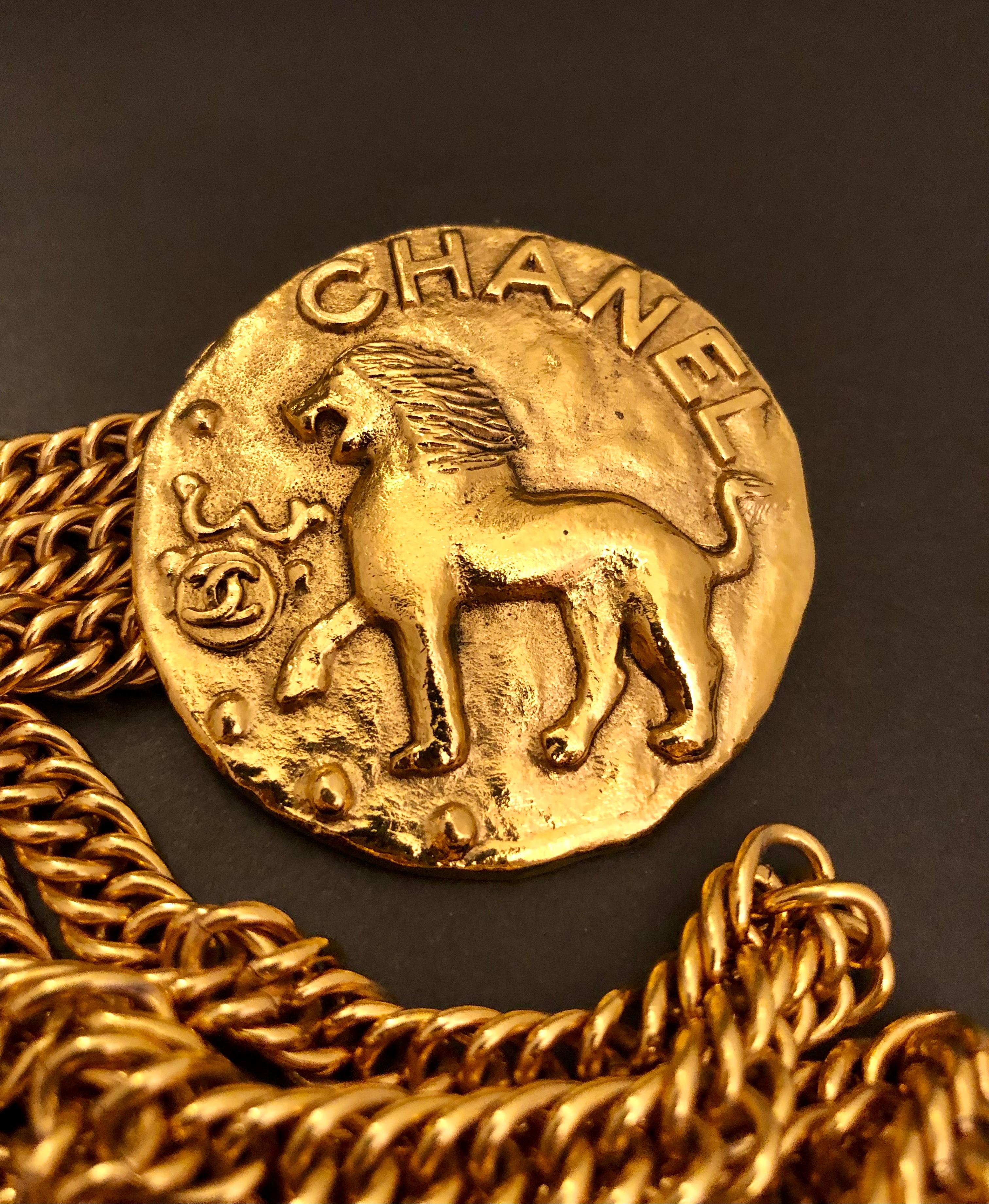 Women's or Men's 1980s Vintage CHANEL Gold Toned Lion Medallion Triple Chain Belt