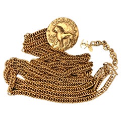 1980s Vintage CHANEL Gold Toned Lion Medallion Triple Chain Belt