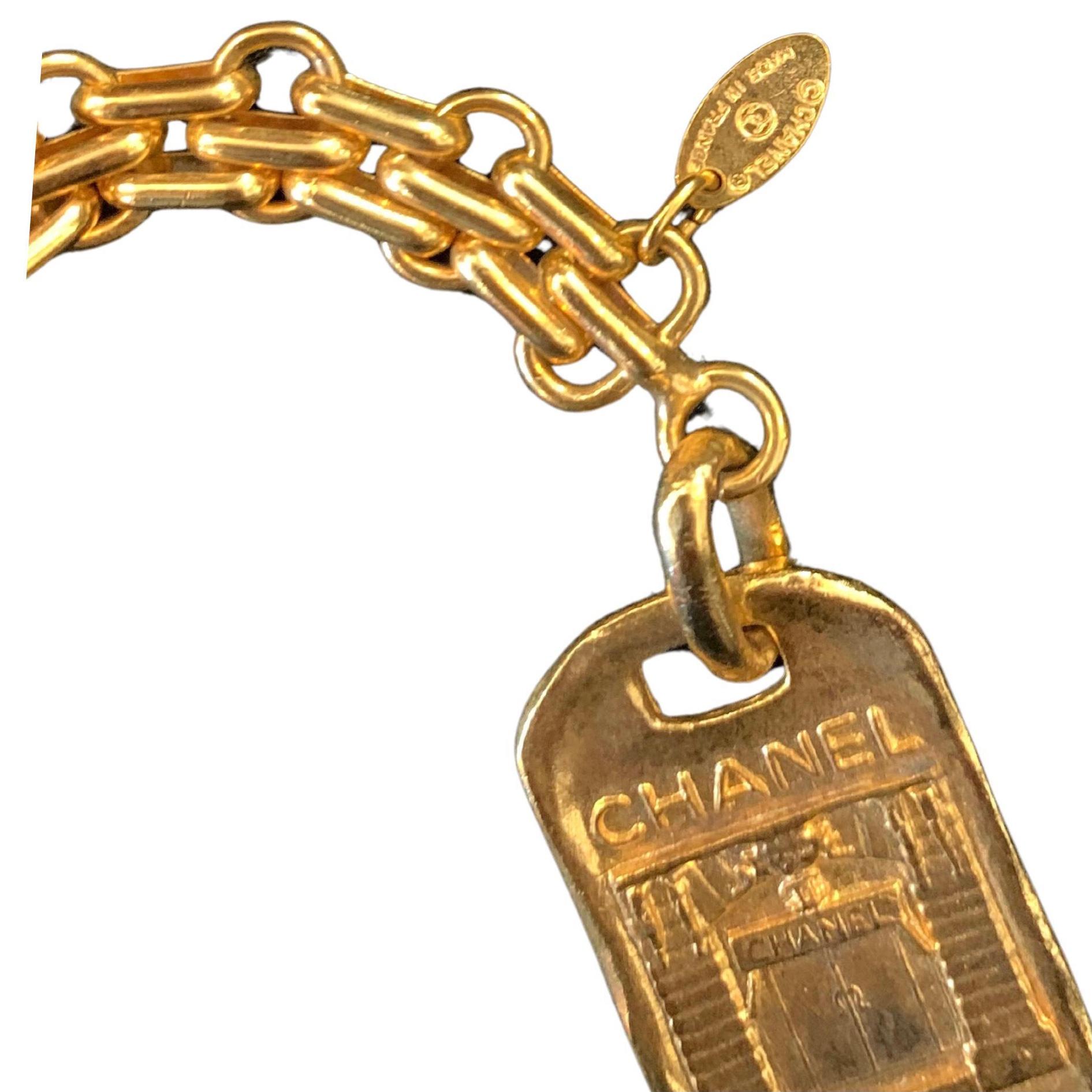 Women's or Men's 1980s Vintage CHANEL Gold Toned Paris Front Door Key Chain Keyring