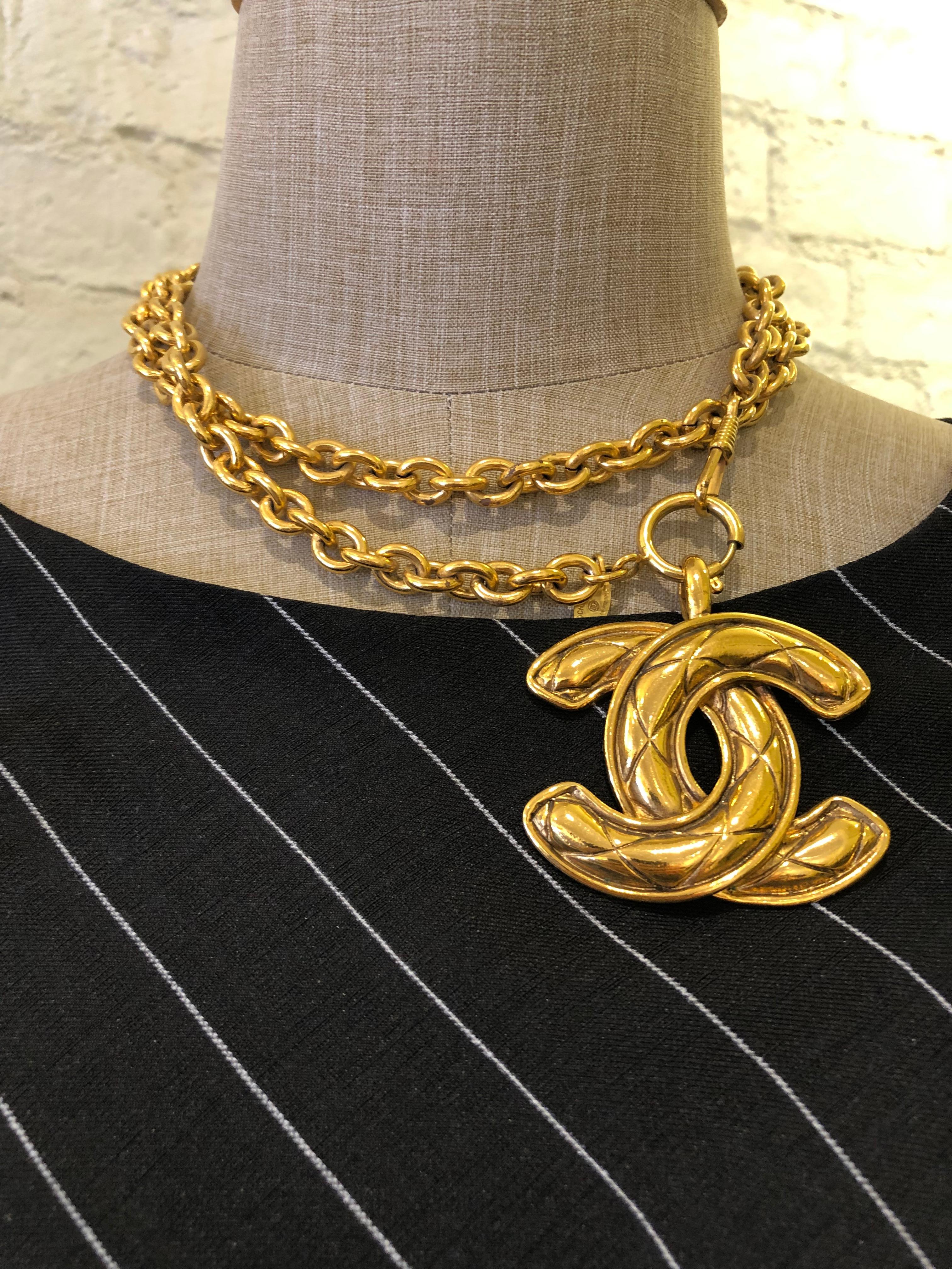 Vintage Chanel gold toned chain necklace featuring a huge iconic gold toned Chanel quilted CC charm. The largest of the quilted CC series. It can be worn single chained as a long necklace or double chained as a short necklace. Stamped CHANEL made in