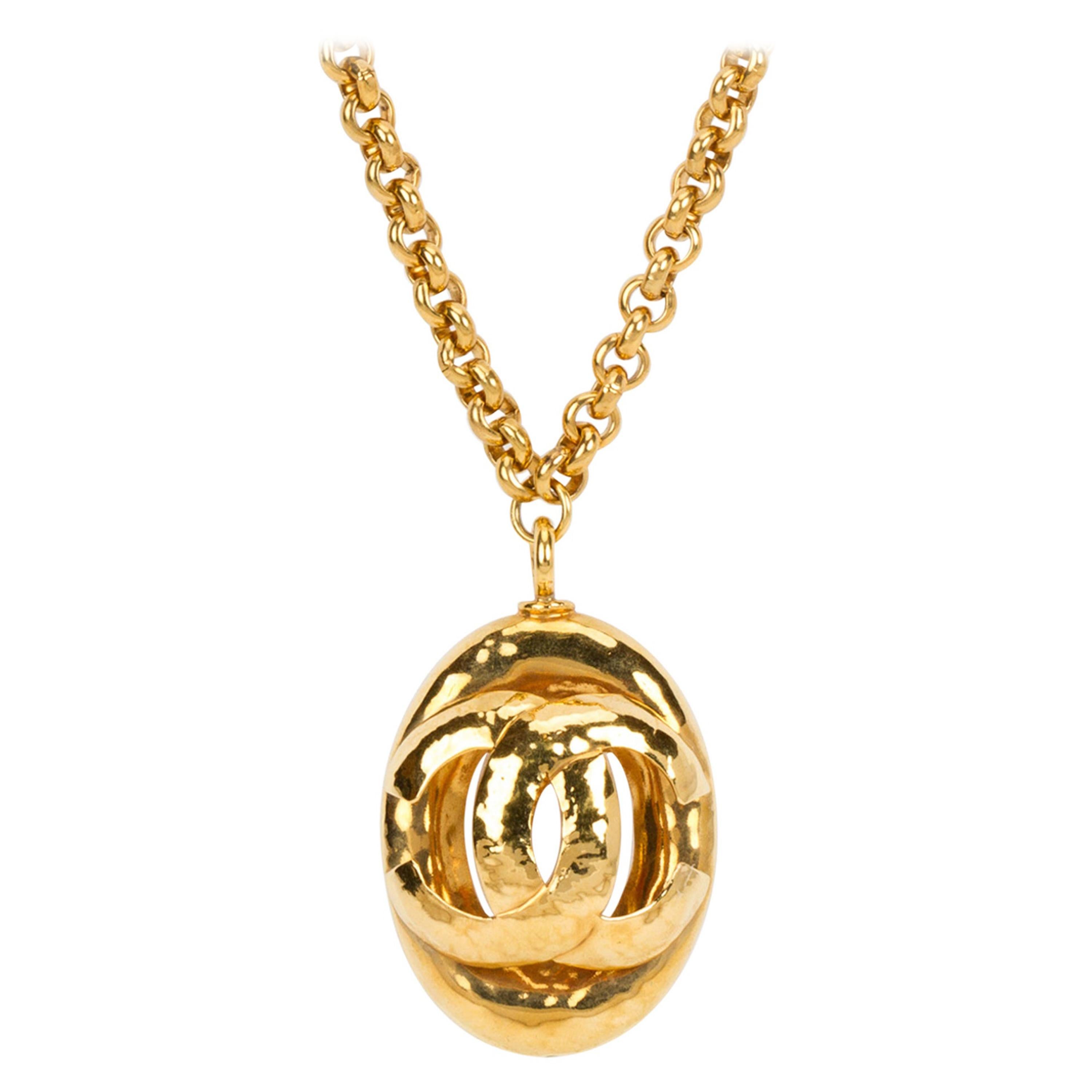 1980's Vintage Chanel Large Oval CC Logo Pendant Gold Necklace