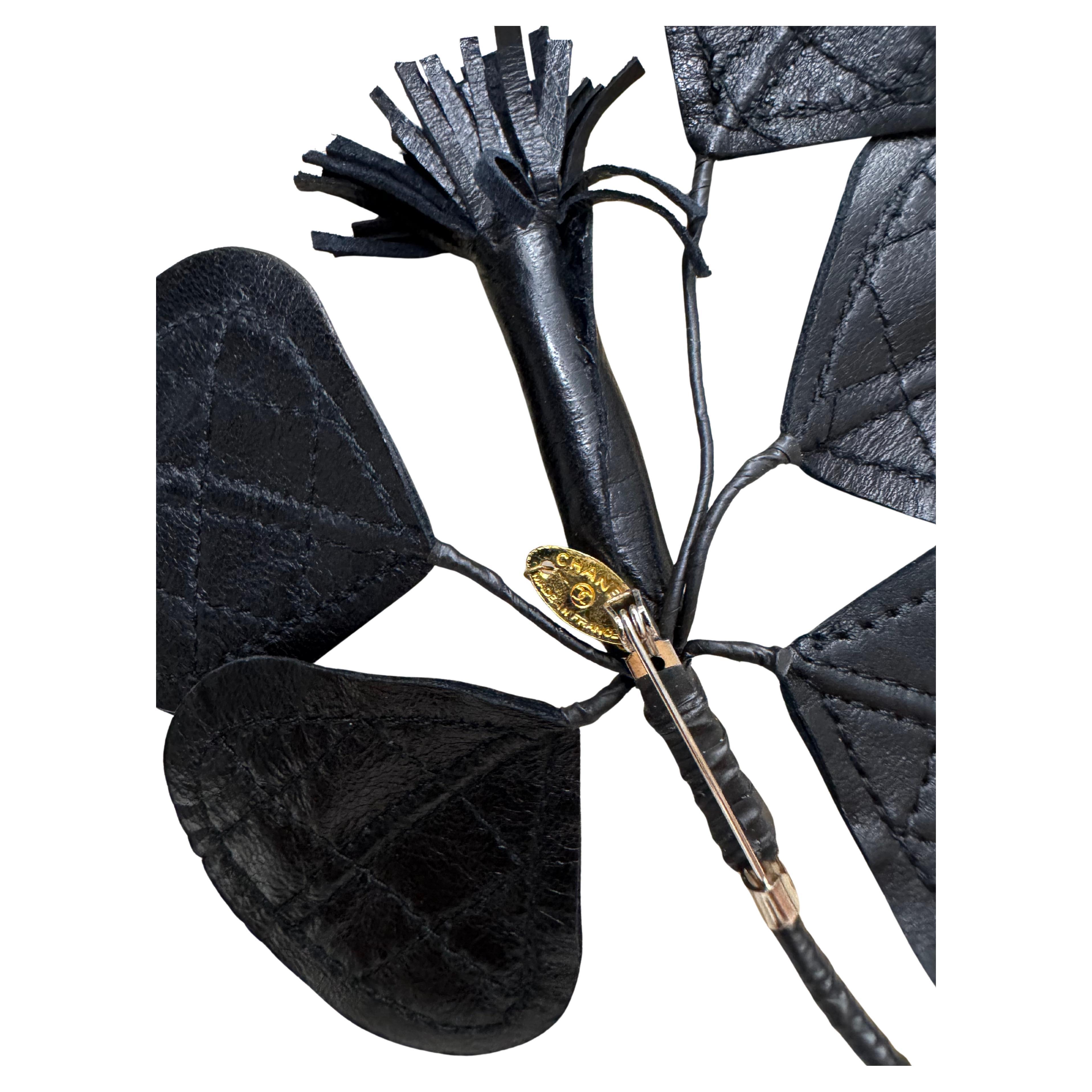 Women's or Men's 1980s Vintage CHANEL Massive Diamond Quilted Leather Floral Brooch Black