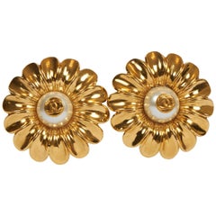 1980's Vintage Chanel Oversized Daisy Clip Logo Earrings