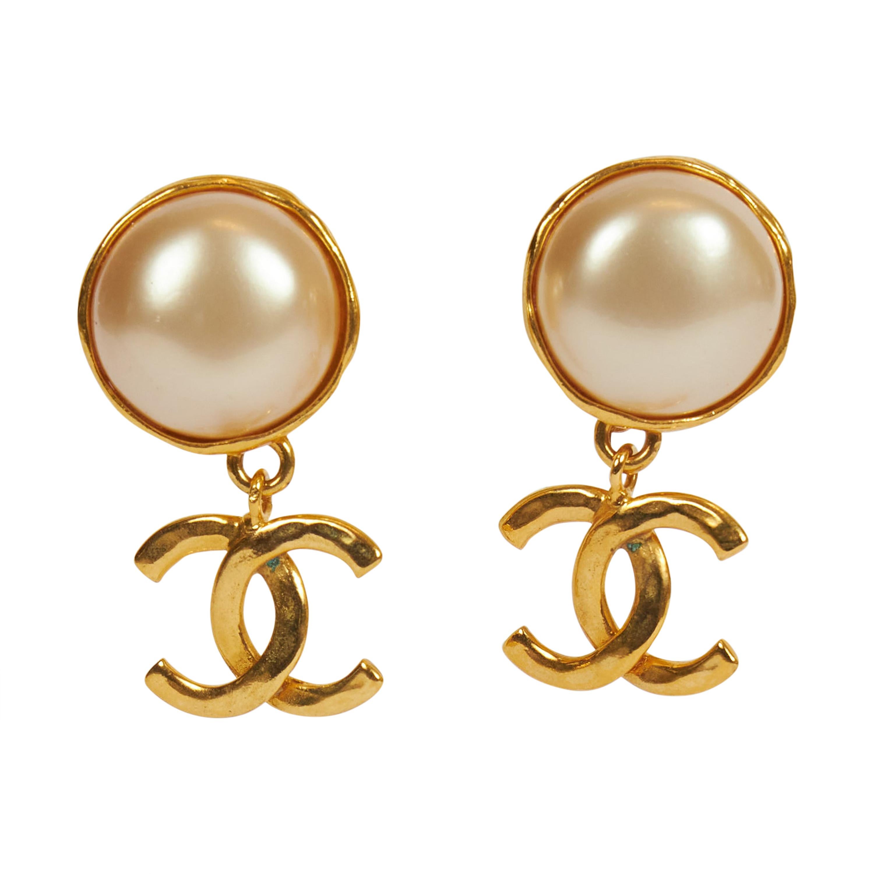 chanel symbol dangle earrings