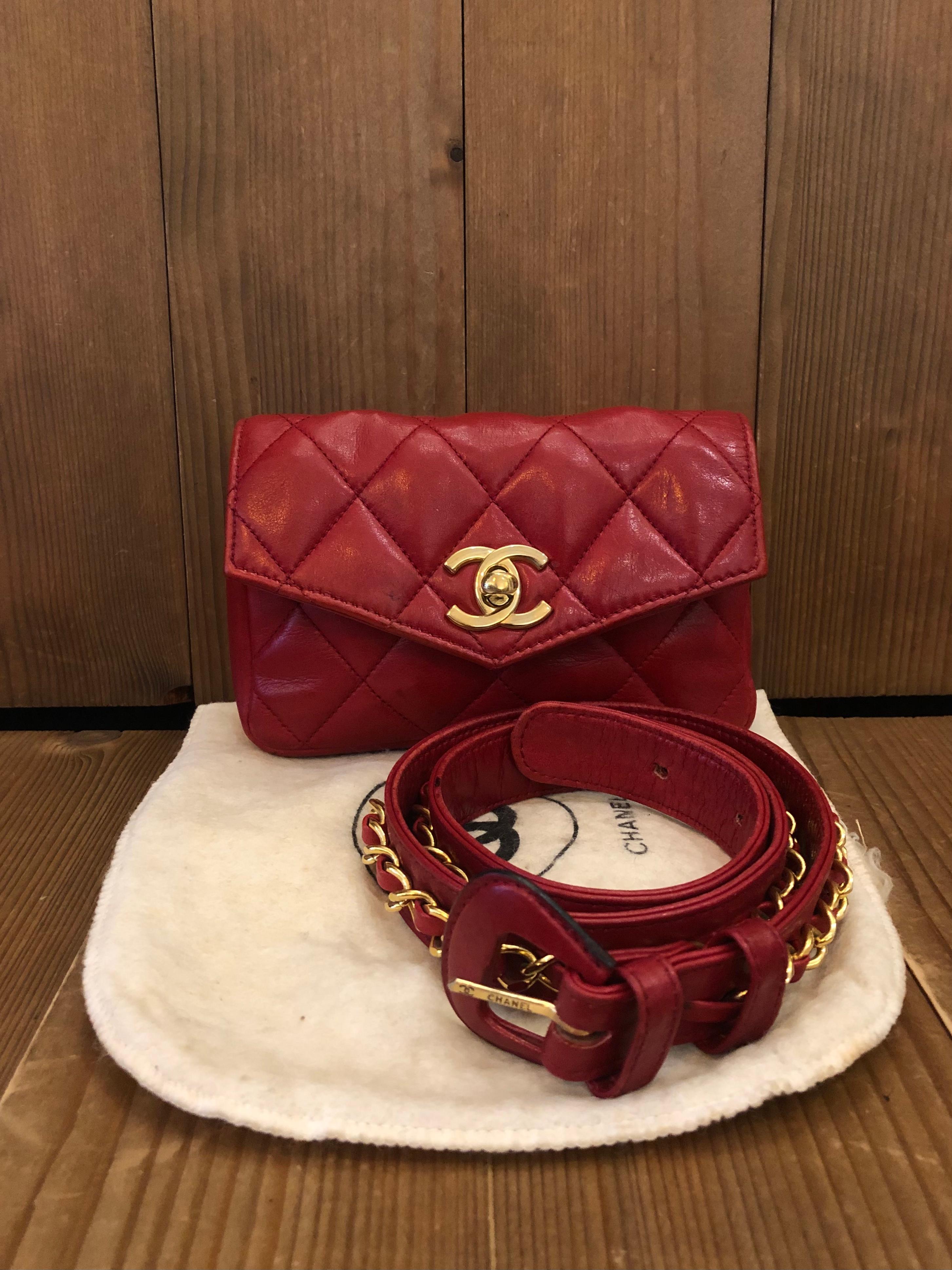 This vintage Chanel belt bag is crafted of lambskin leather in red featuring gold toned hardware. Measures approximately 6 x 4 x 1 inches Belt size 70/28 fits waist 26 - 29 inches. Made in Italy. This Chanel belt bag was manufactured in the 1980s