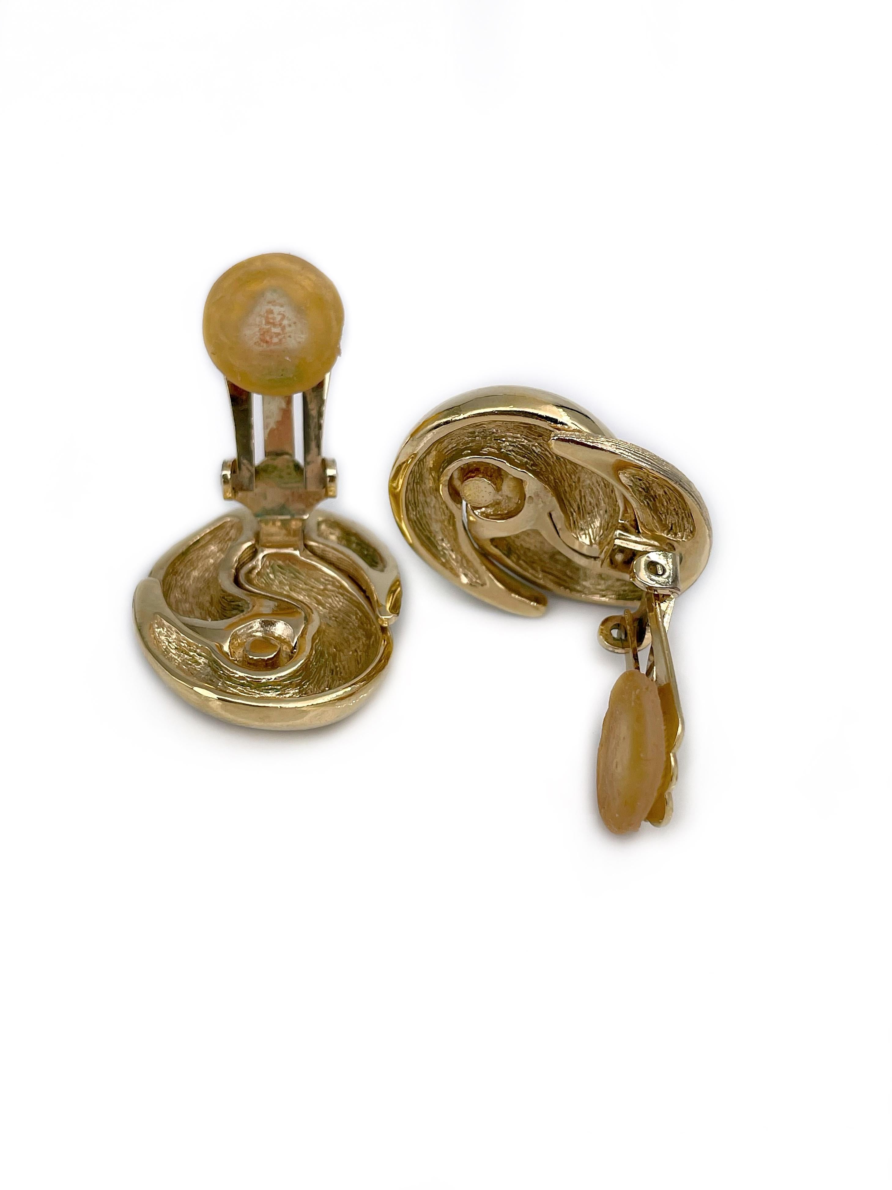 Modern 1980s Vintage Christian Dior Gold Tone Knot Twist Clip on Earrings