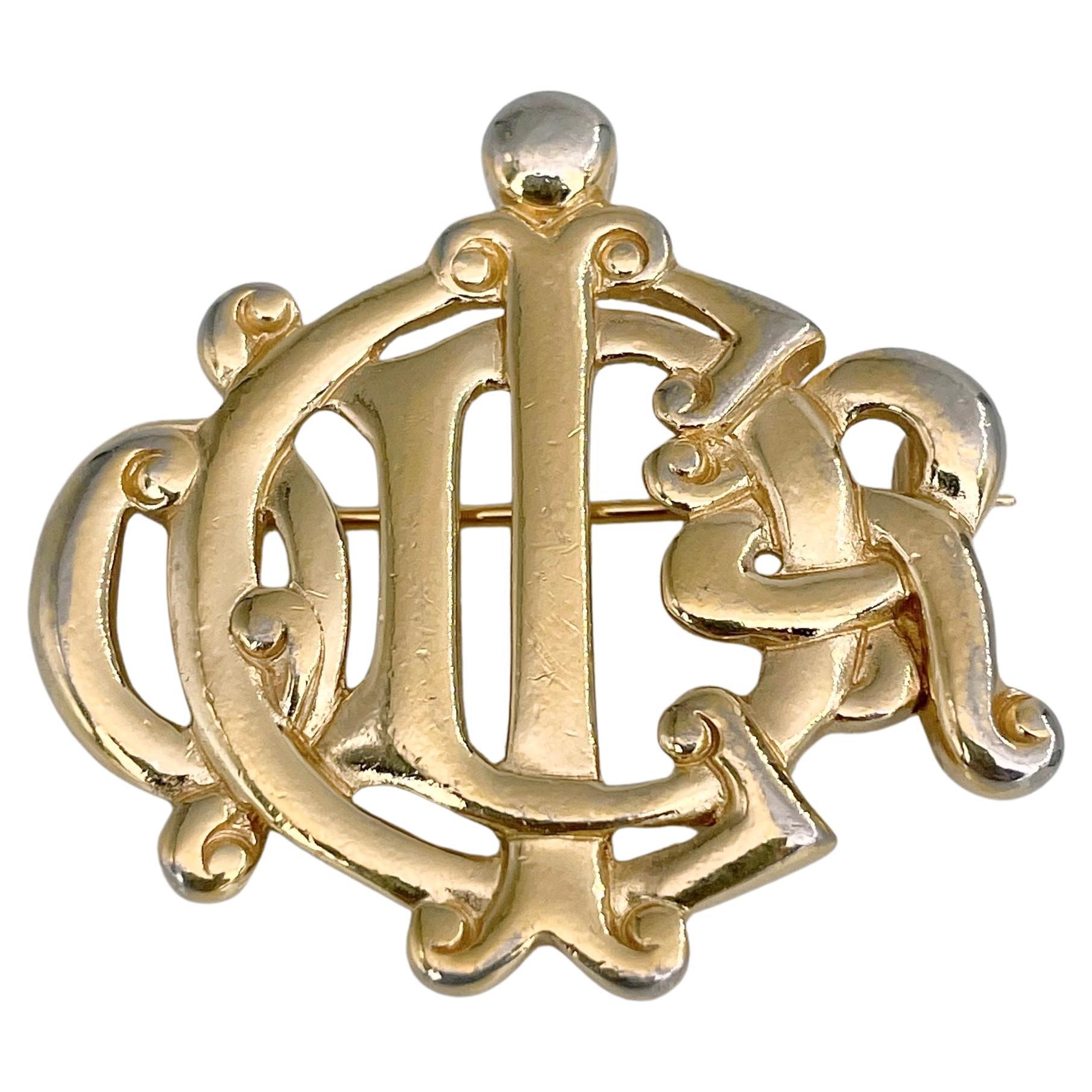 1980s Vintage Christian Dior Gold Tone Logo Monogram Pin Brooch For Sale