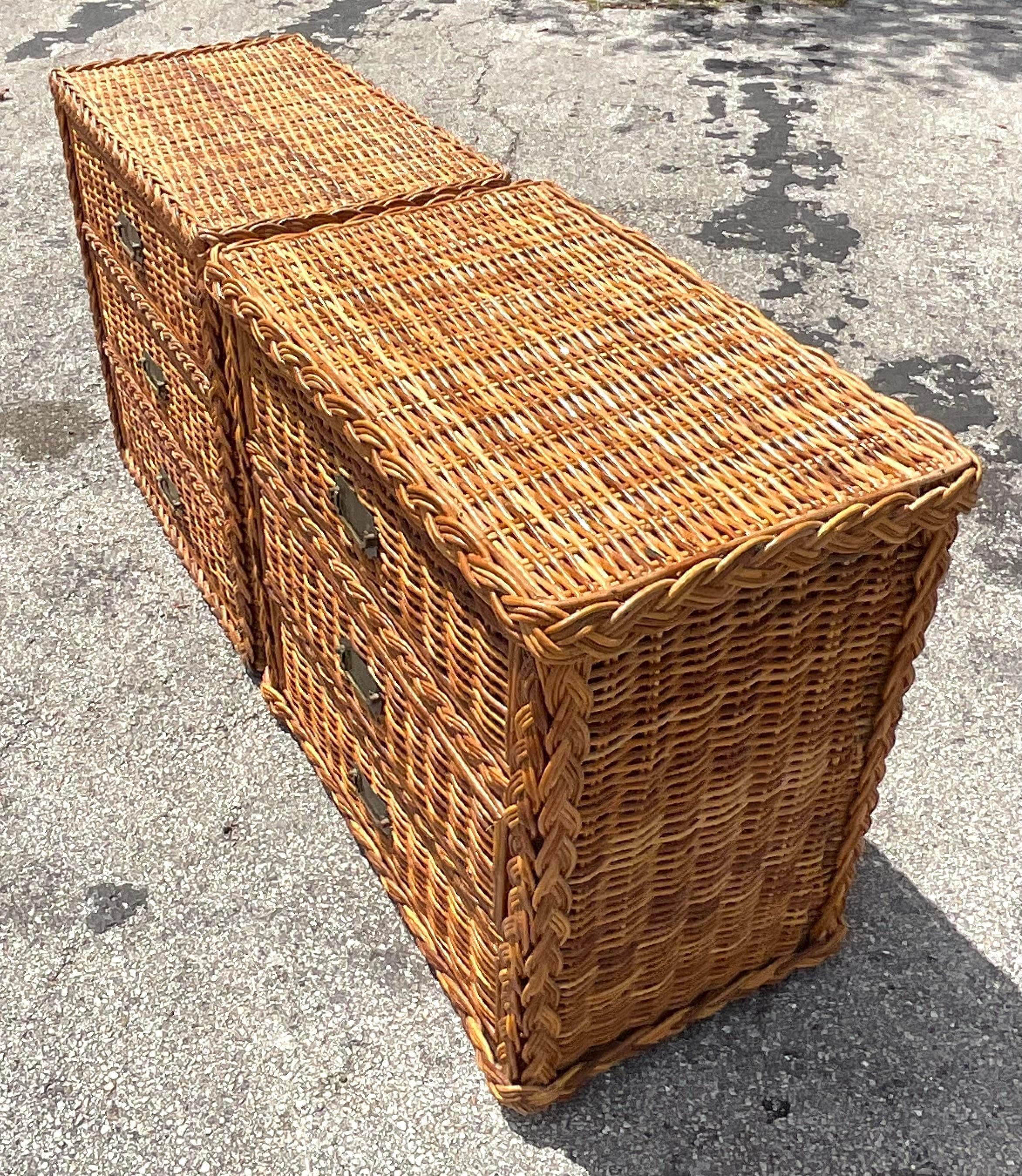 Evoke the breezy allure of coastal retreats with this pair of Vintage Coastal Woven Rattan Chests of Drawers. Crafted with exquisite woven rattan detailing, these chests embody the laid-back elegance of American coastal style. Perfect for infusing