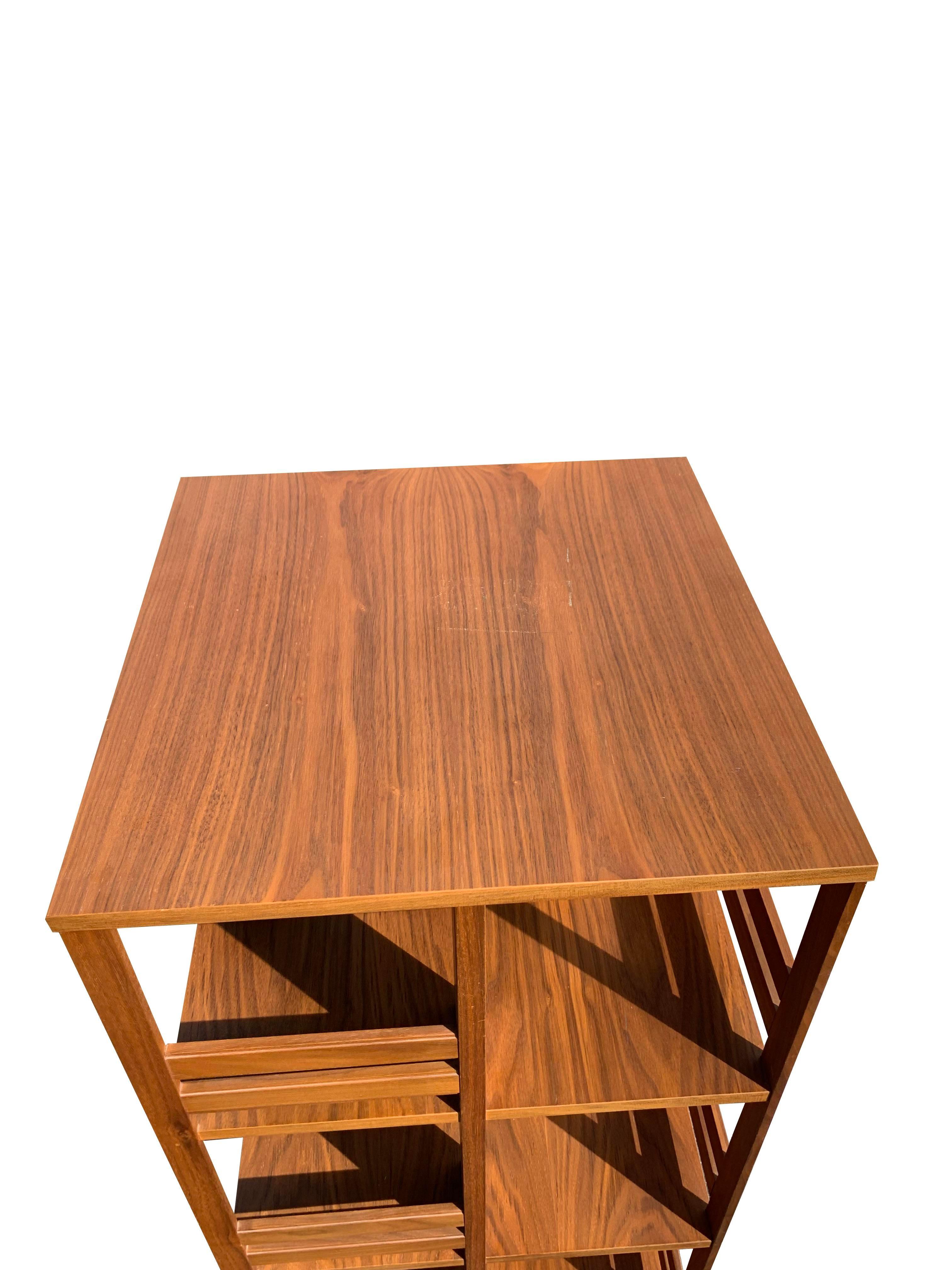 1980s Vintage Danish Style Teak Modern Rotating Bookcase with X Base, Style In Good Condition In Saddle River, NJ