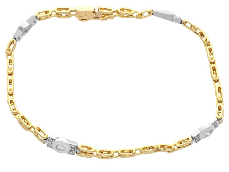 A fine and impressive vintage 0.60 carat diamond and 18 karat yellow gold, 18 karat white gold set bracelet; part of our diverse diamond jewelry collection

This fine and impressive diamond bracelet has been crafted in 18k yellow gold.

The fancy