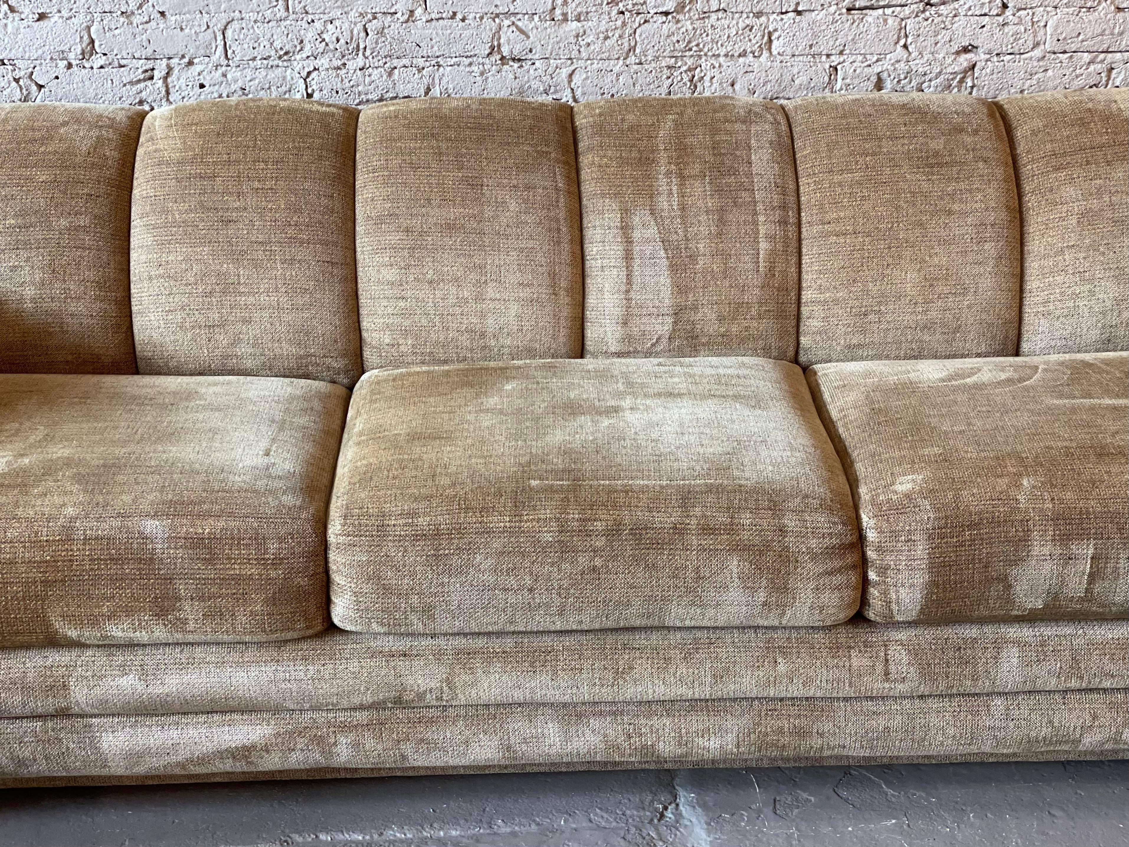 I bought this sofa because I loved the shape. Only to discover it’s made by directional with original tags still on. It’s so comfy. Cushions and fabric are in excellent condition.

Dimensions: 94