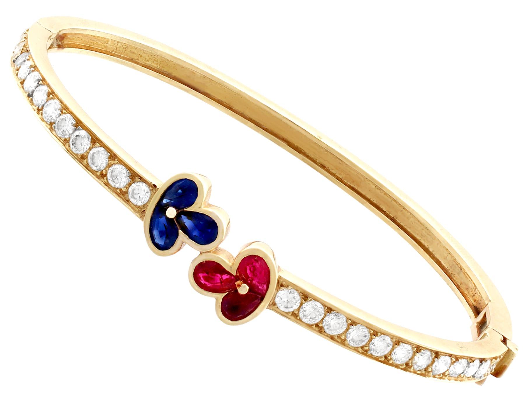 1980s Vintage French 1.05 Carat Ruby 2.16 Carat Diamond and Sapphire Gold Bangle In Excellent Condition For Sale In Jesmond, Newcastle Upon Tyne