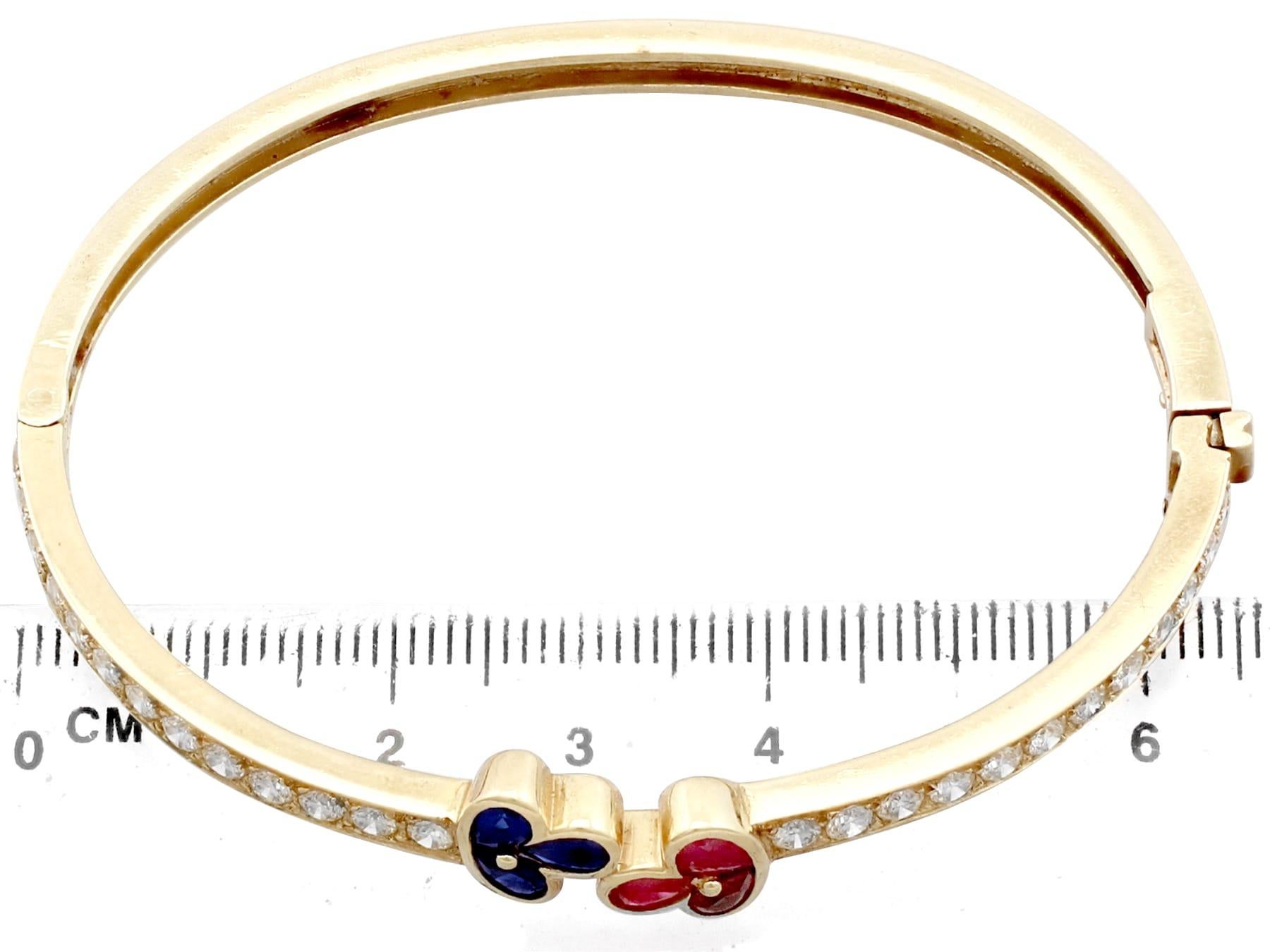 1980s Vintage French 1.05 Carat Ruby 2.16 Carat Diamond and Sapphire Gold Bangle For Sale 3