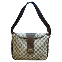 Bolso de hombro de lona con monograma GUCCI vintage de los años 70 marrón