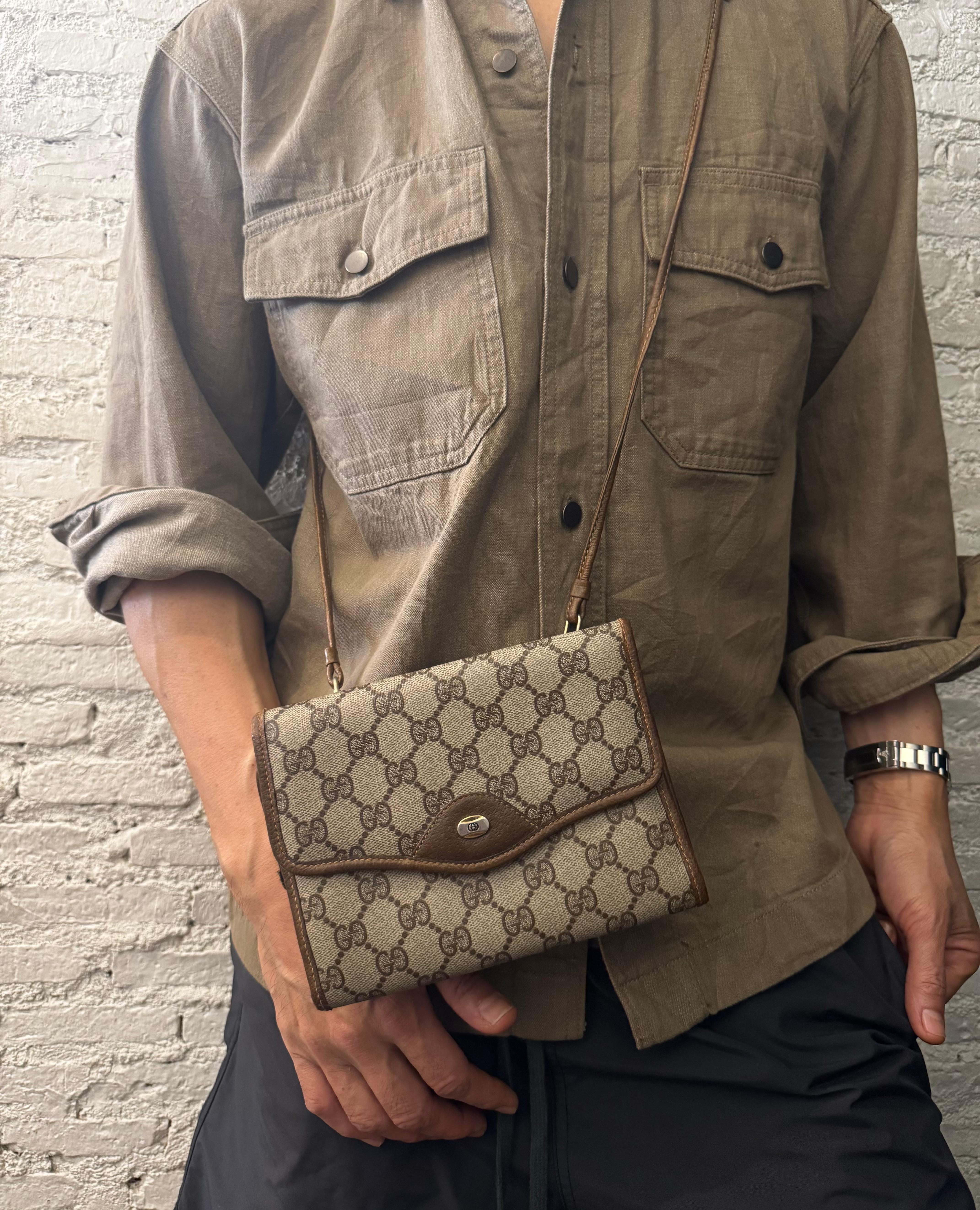 Women's or Men's 1980s Vintage GUCCI Monogram Canvas Mini Tri-Fold Crossbody Bag Brown For Sale
