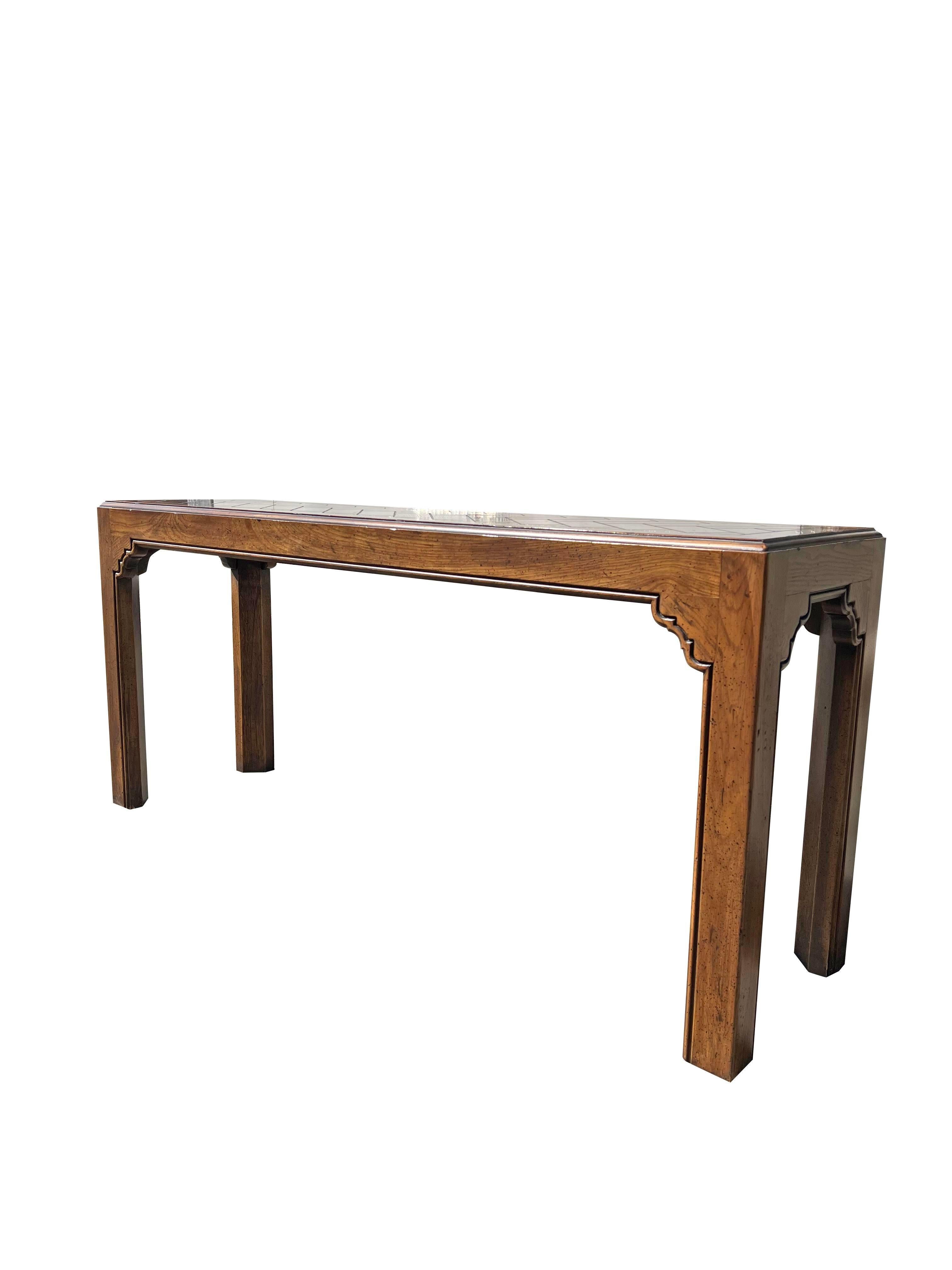 Vintage Henredon Console Table

This vintage console table is a must-have for anyone looking to add a touch of sophistication and elegance to their home. The unique design and functional features make it a versatile and stylish piece that will