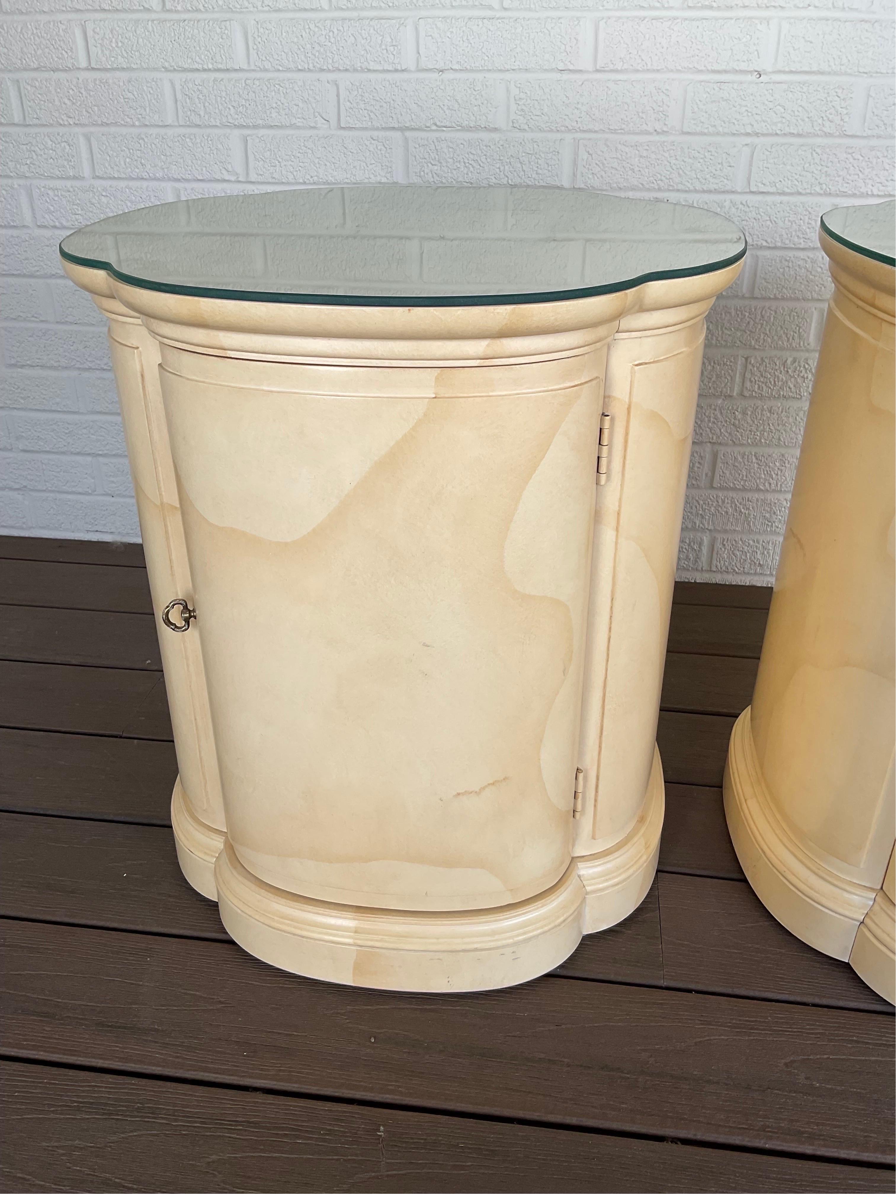 Beautiful vintage Henredon Side Tables with ample storage below and custom cut glass tops. From Henredon's Faux Goatskin collection the pieces in this collection have developed a sort of cult following and have become sought after by collectors and