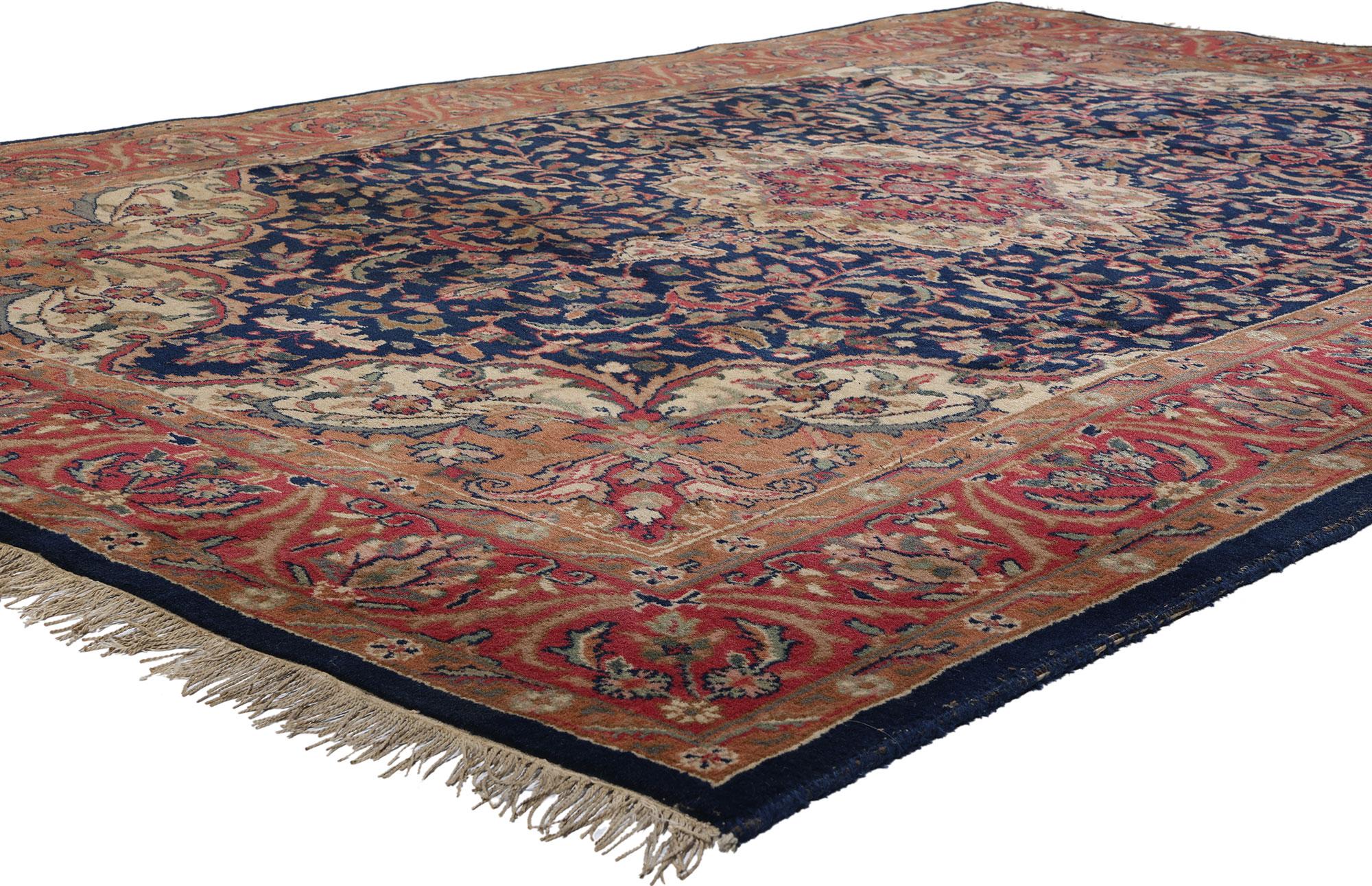 78690 Vintage Indian Isfahan Rug, 05'09 x 09'00. Step into the realm of timeless elegance with this exquisite hand-knotted wool Indian Isfahan rug, where opulence meets tradition in every meticulously woven thread. At its heart lies a captivating
