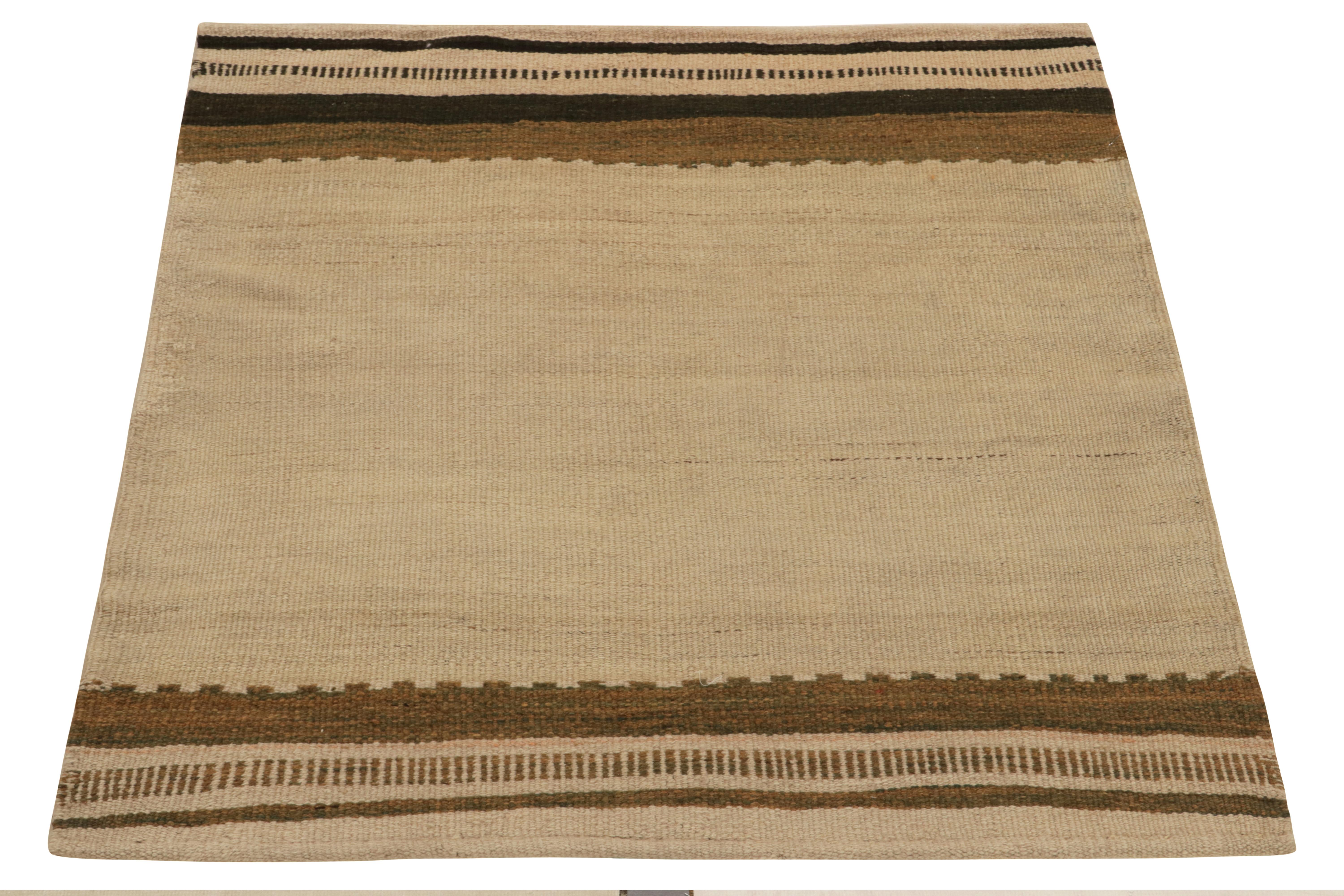 Originating circa 1980-1990, a tribal piece joining our prestigious collection of vintage flatweaves—a collectible Persian Sofreh curation among our latest. The 3x3 piece enjoys an open field with striped borders in a neutral beige-brown color way