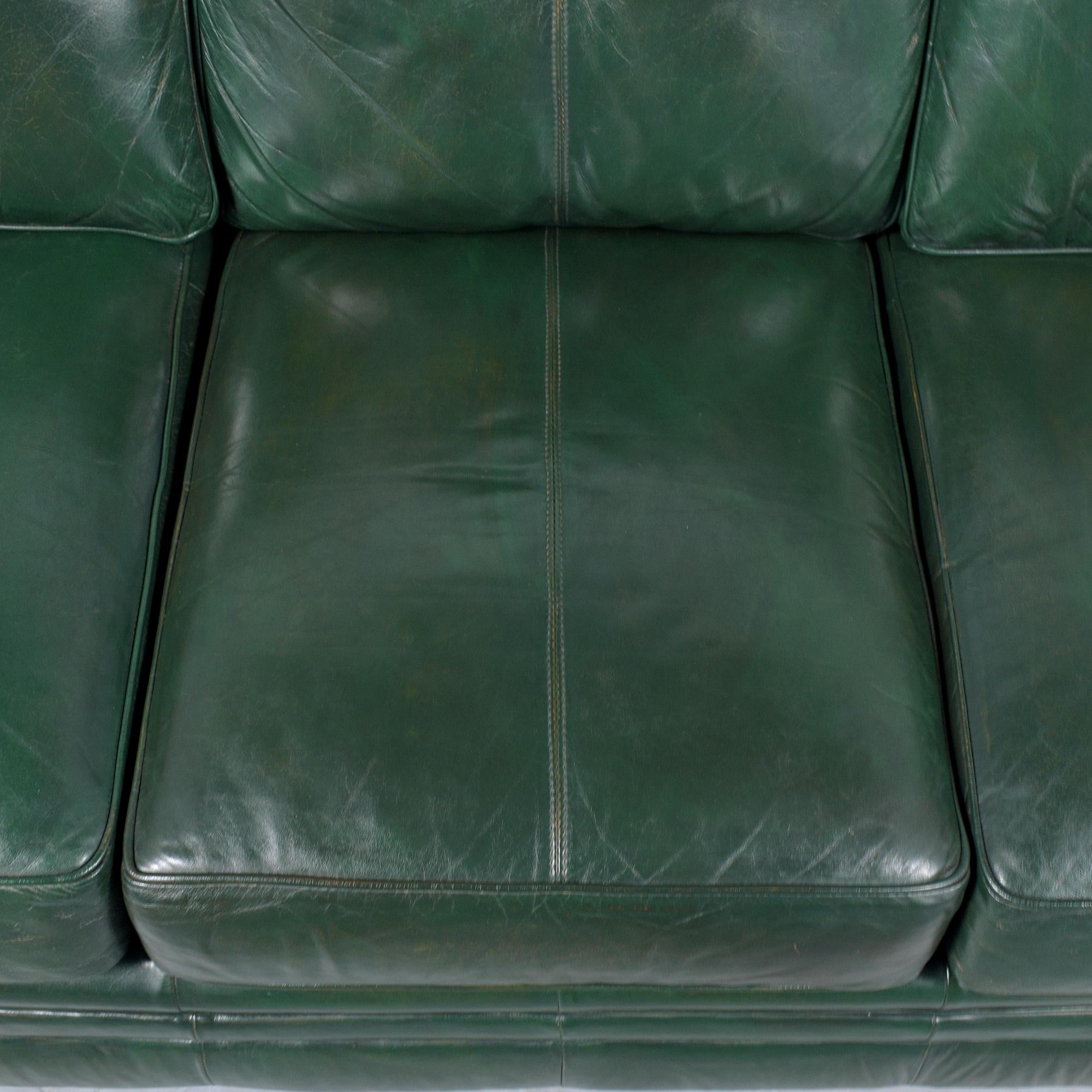 Mid-Century Modern Restored 1980s Vintage Leather Sofa in Dark Green with Carved Bun Legs For Sale