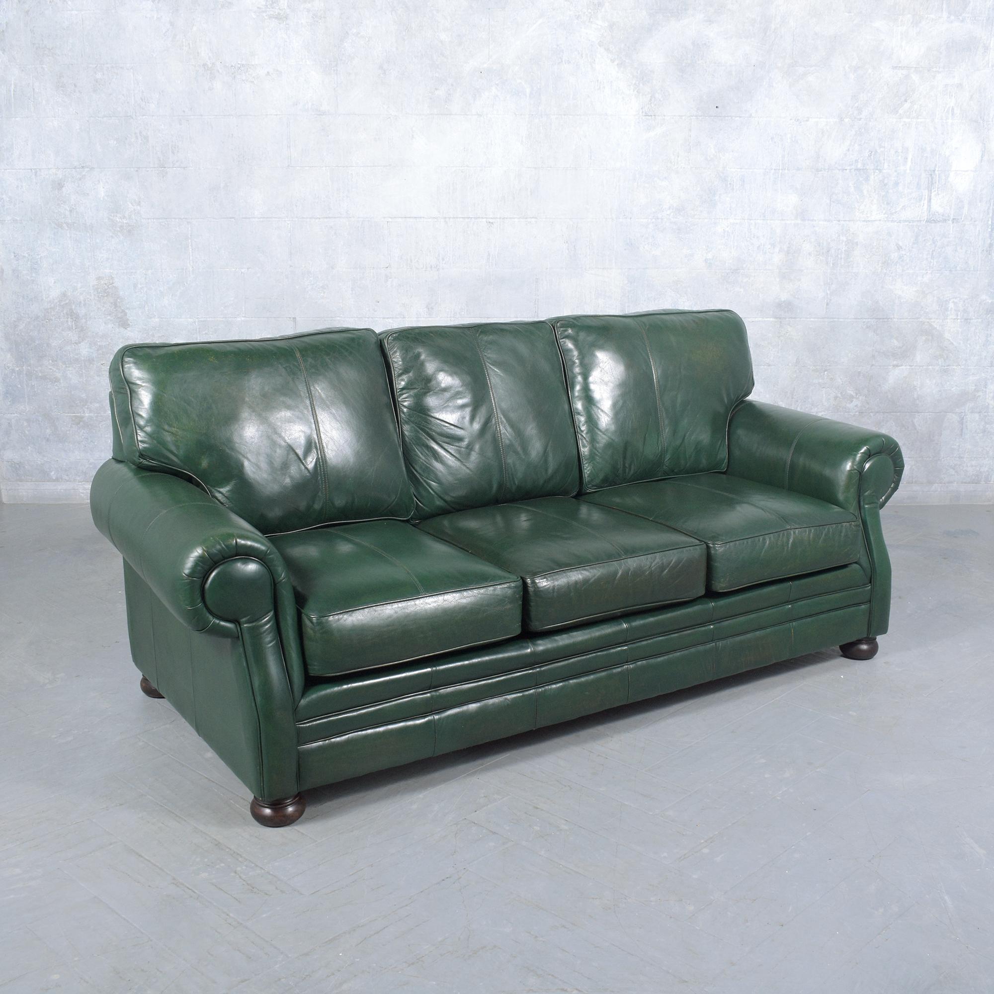 Restored 1980s Vintage Leather Sofa in Dark Green with Carved Bun Legs In Good Condition For Sale In Los Angeles, CA