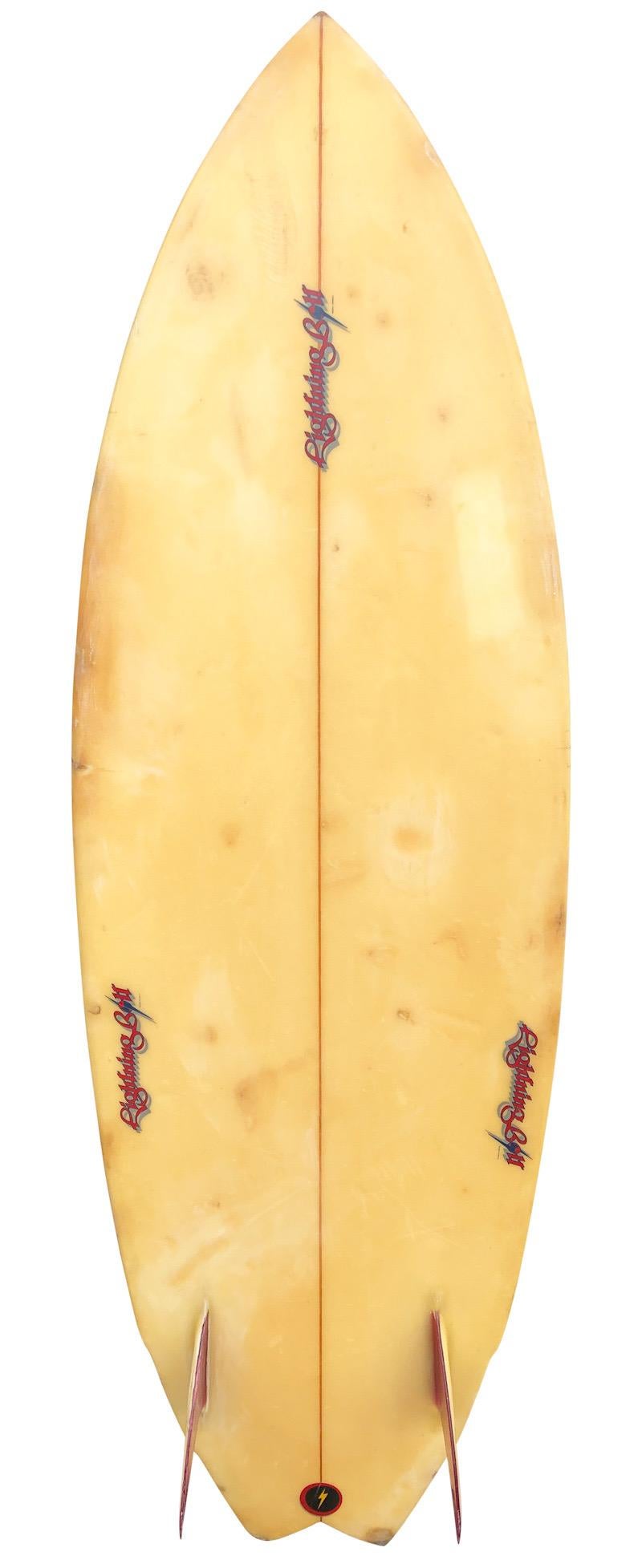 Mid-1980s lightning bolt Surfboard Rory Russell Model. Features a swallow tail twin fin shape with unique design consisting of numerous Lightning Bolt jags with vibrant rainbow color theme. The surfing legend Rory Russell was a 1st string Lightning