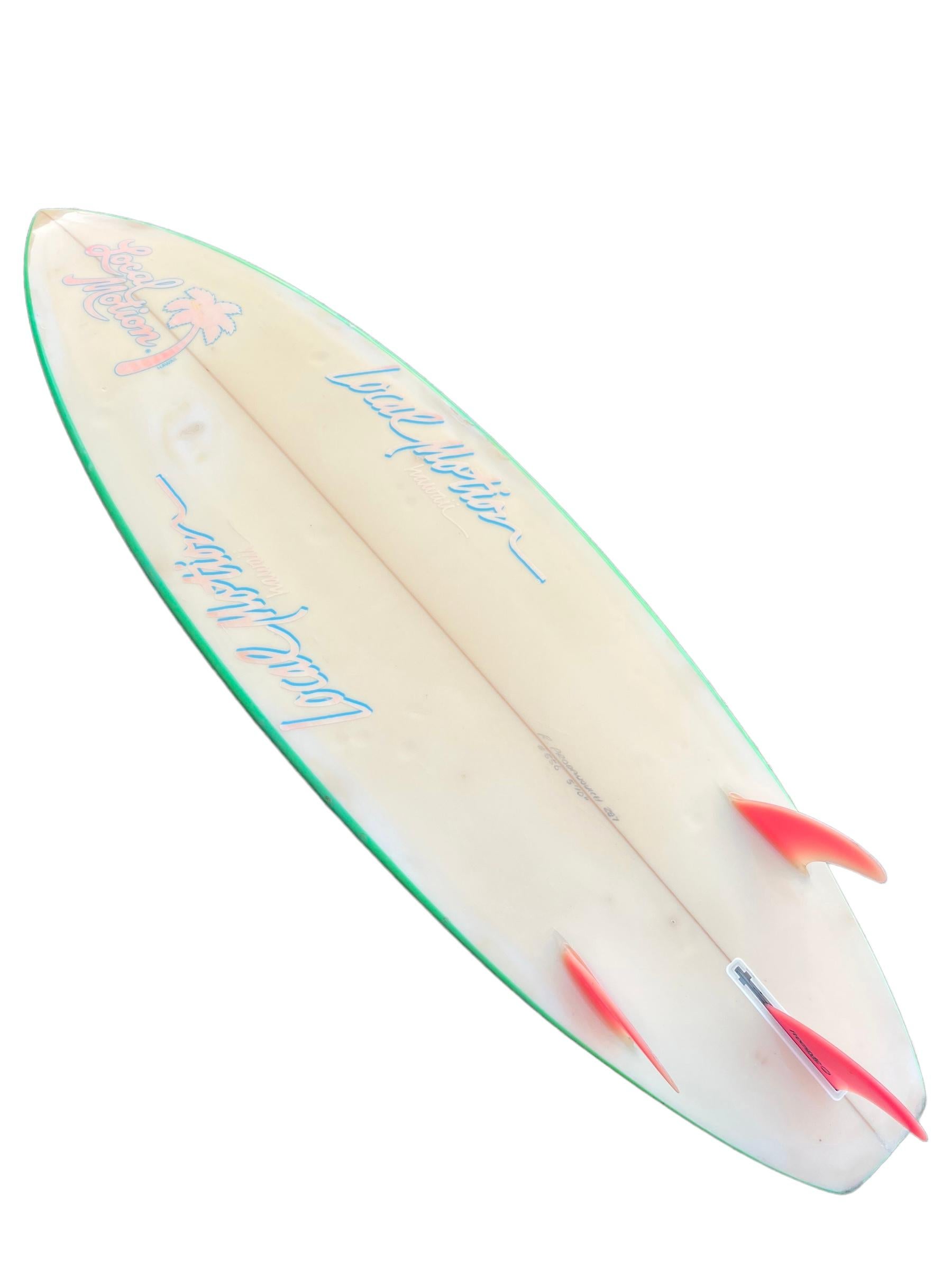 Mid-1980s Local Motion shortboard made by Robin Prodanovich. Features a retro 1980s neon island style airbrush with neon orange tri-fins. A unique example of a Local Motion surfboard with swaying palm trees and bright colors indicative of the 1980s.