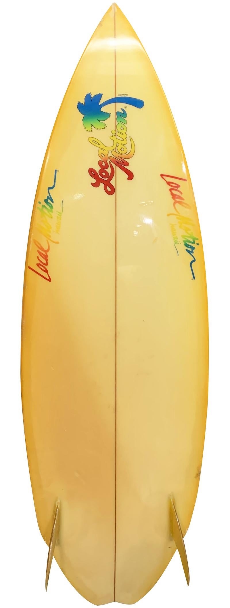 Mid-late 1980s vintage local motion twin-fin surfboard shaped by Pat Rawson. Featuring rainbow Local Motion laminates with a glassed on twin-fin setup. A great example of a 1980s retro shortboard in all original condition.

Pat Rawson is one of