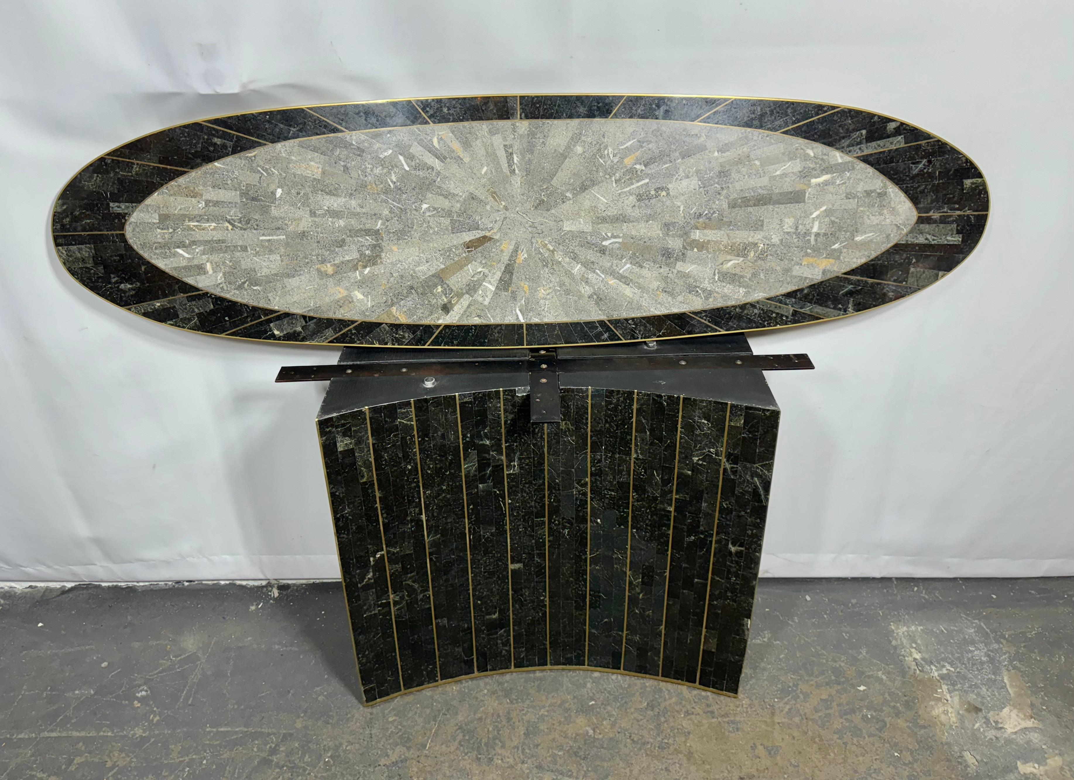 Gorgeous tessellated stone cONSOLE Table made by Maitland Smith. Starburst patterned ,, amazing tones of grays, blacks, browns , whites.. Brass trim and inlays.. Hand delivery avail to New York City or anywhere en route from buffalo ny. 