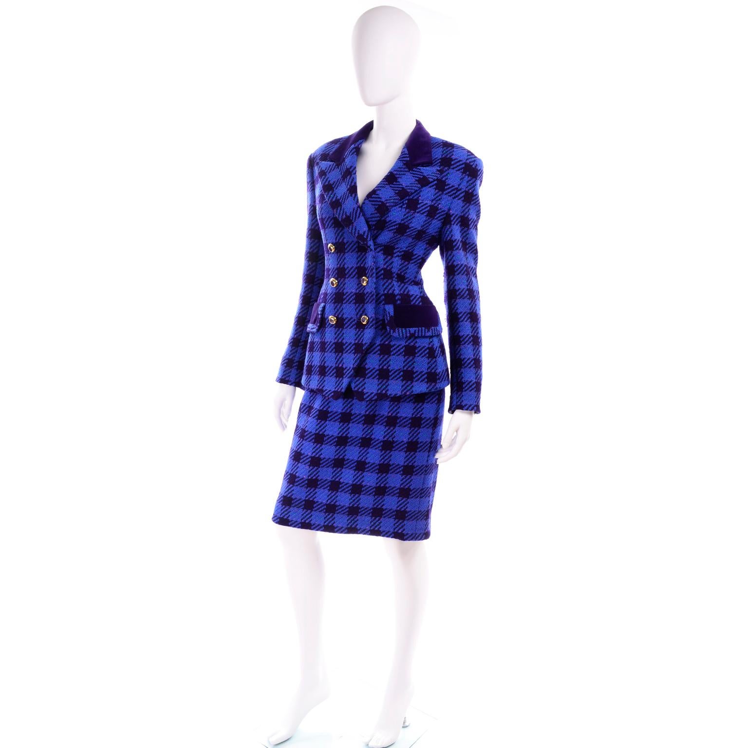 This vintage Escada Electric blue and navy blue plaid skirt suit was made in Germany in the 1980's.  The fully lined suit includes a slim wool skirt and a double breasted wool jacket with purple velvet trim. The suit came with a gorgeous silk blouse